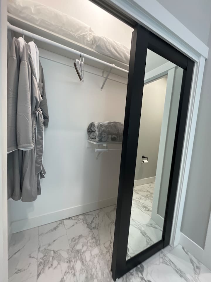 This full sized closet is big enough to accommodate your wardrobe and suitcase during your stay!  You will find 2 robes hanging and extra blankets/linens to use as needed!