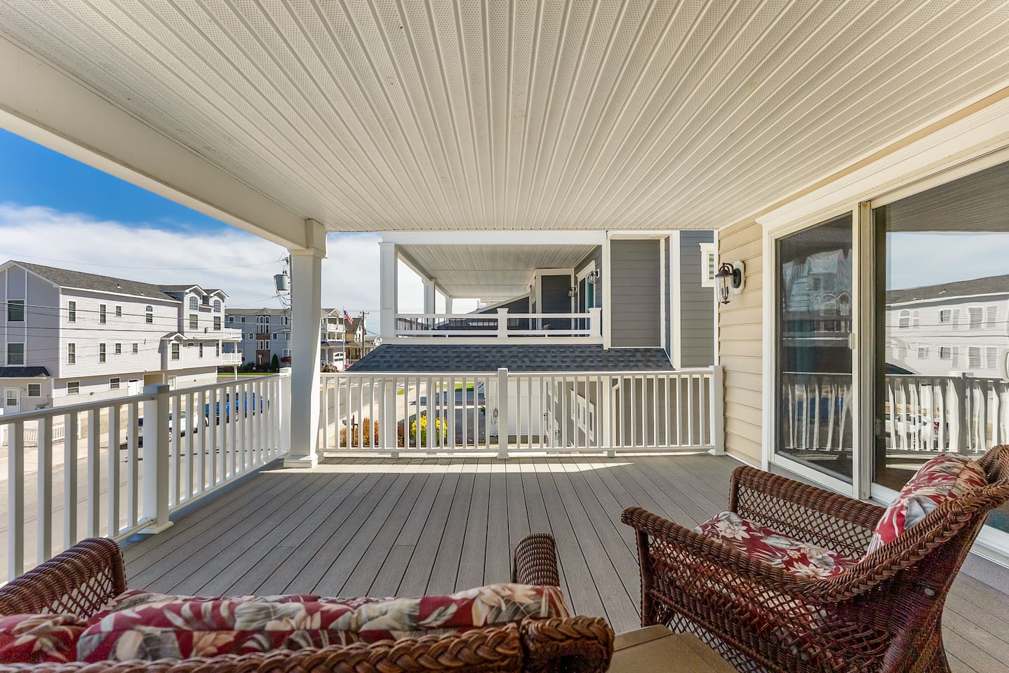 Private covered deck off of 2nd floor front bedroom with beautiful views of the ocean. 