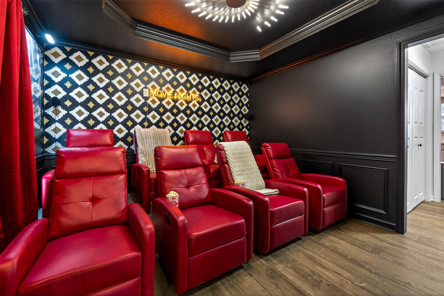 Movie theater is painted black with black out curtains for that perfect daytime movie experience!