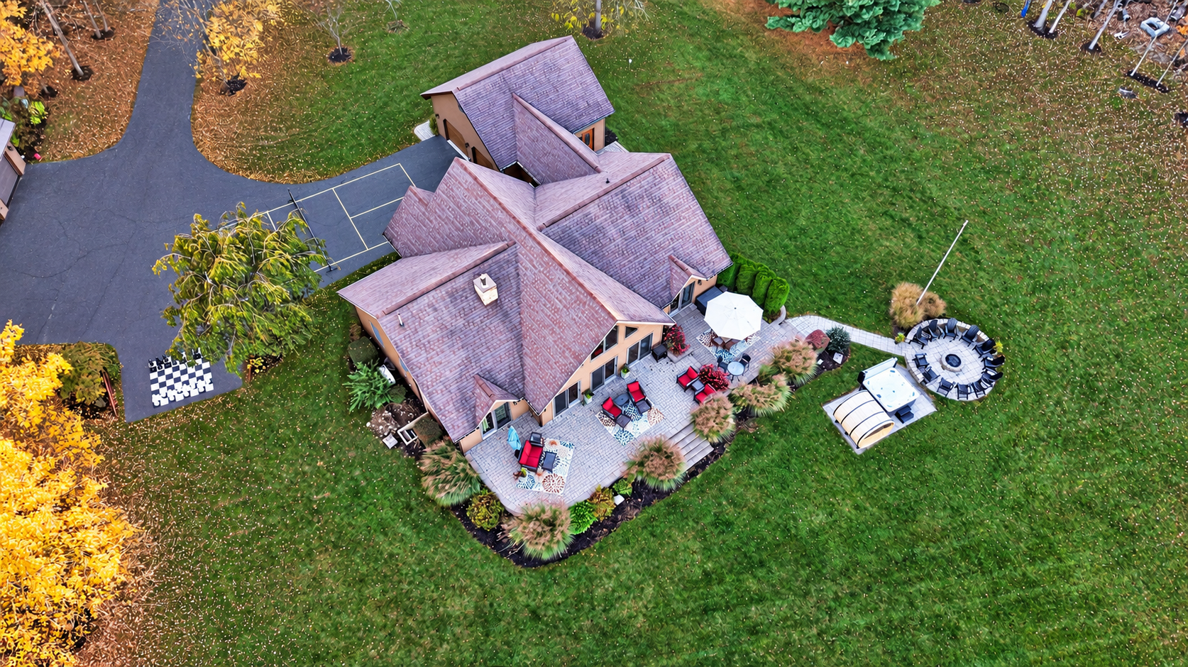 Aerial view of house and outdoor amenities