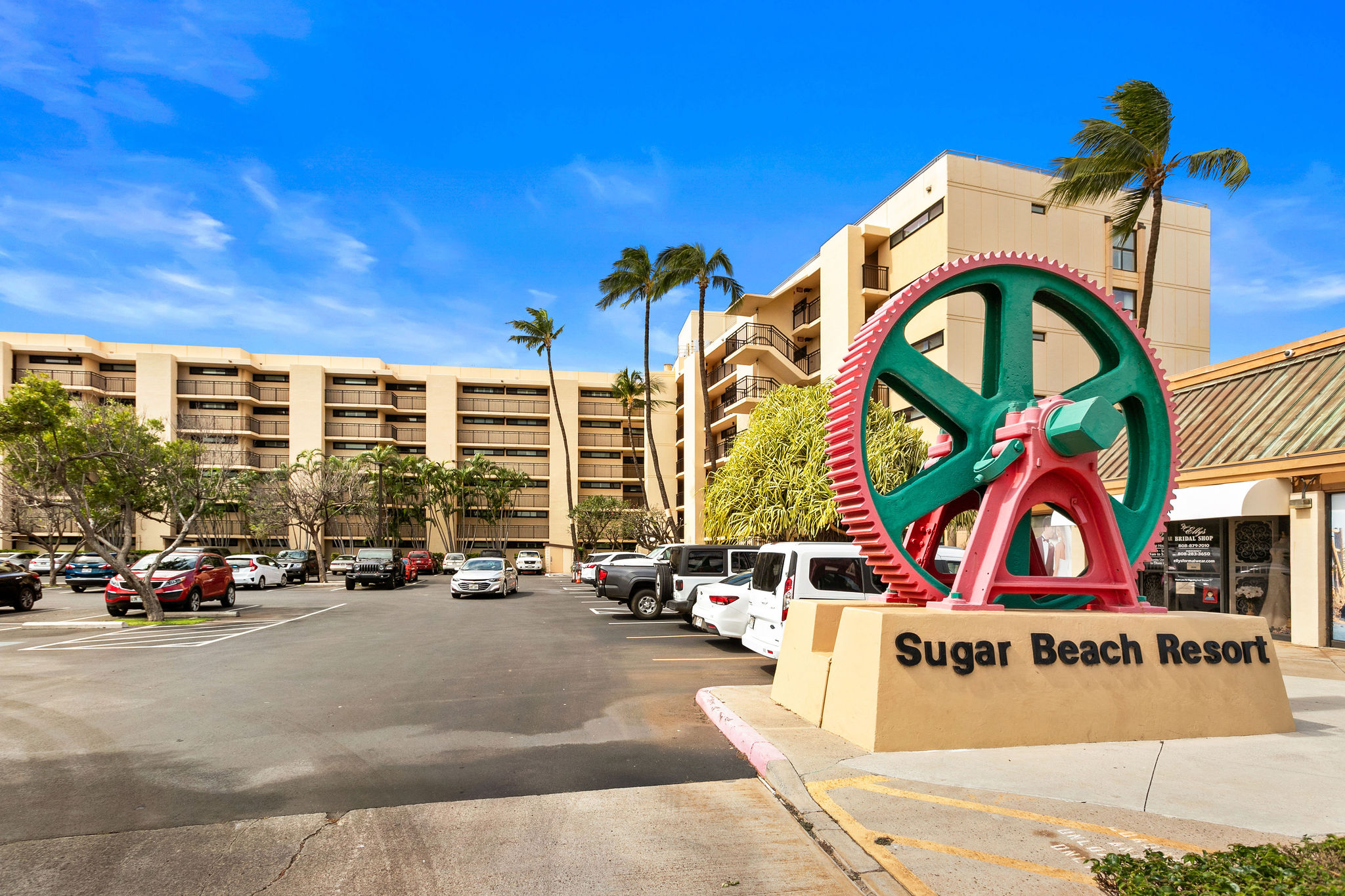 Welcome to Sugar Beach Resort. Complimentary parking, this is the entry you want to park at for best access to the condo