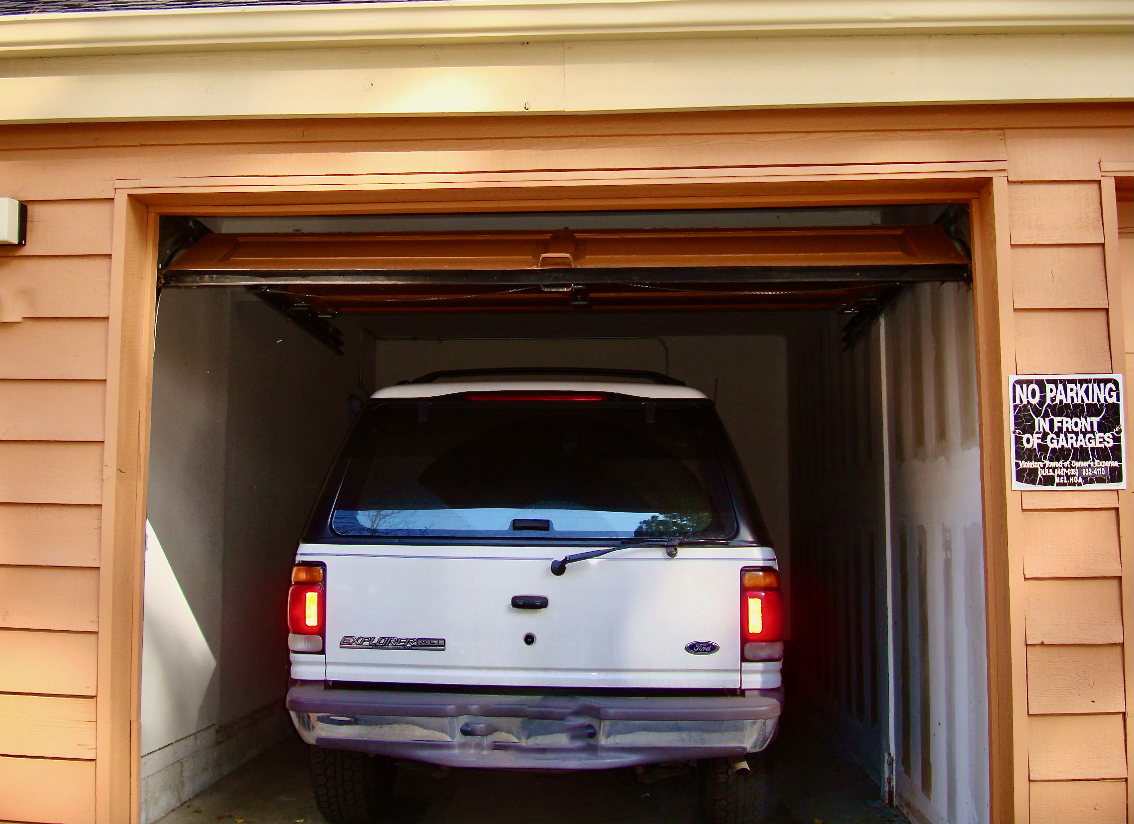 Convenient garage accommodates small and narrow vehicles.