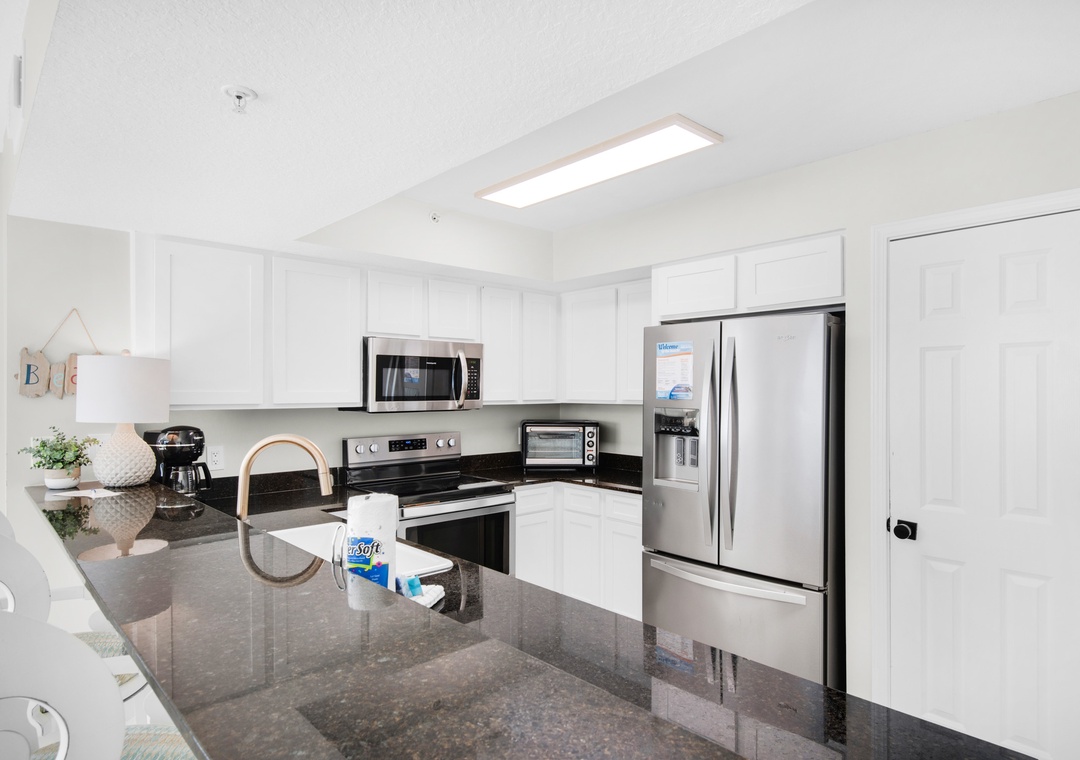 Modern kitchen equipped for cooking