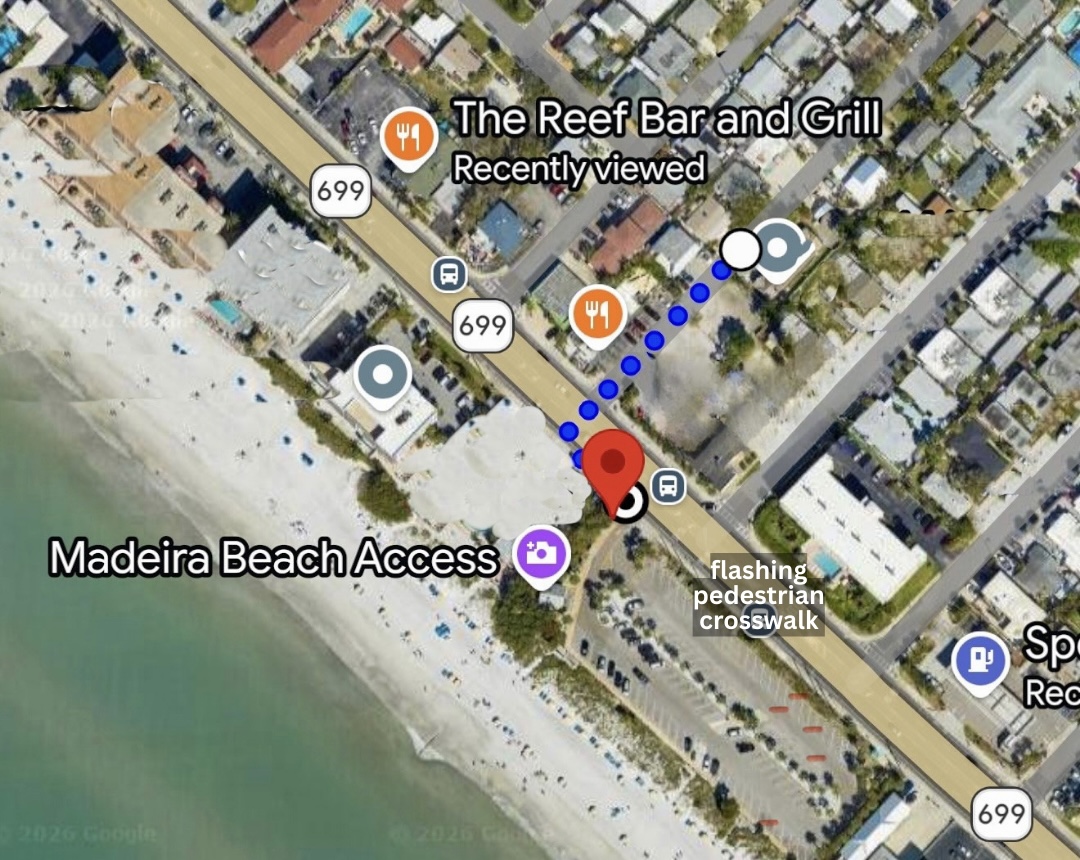 About a 2–3 minute walk to the beach access. A nearby flashing pedestrian crosswalk makes crossing Gulf Blvd easy and safe. Beach access includes restrooms and a rinse station.