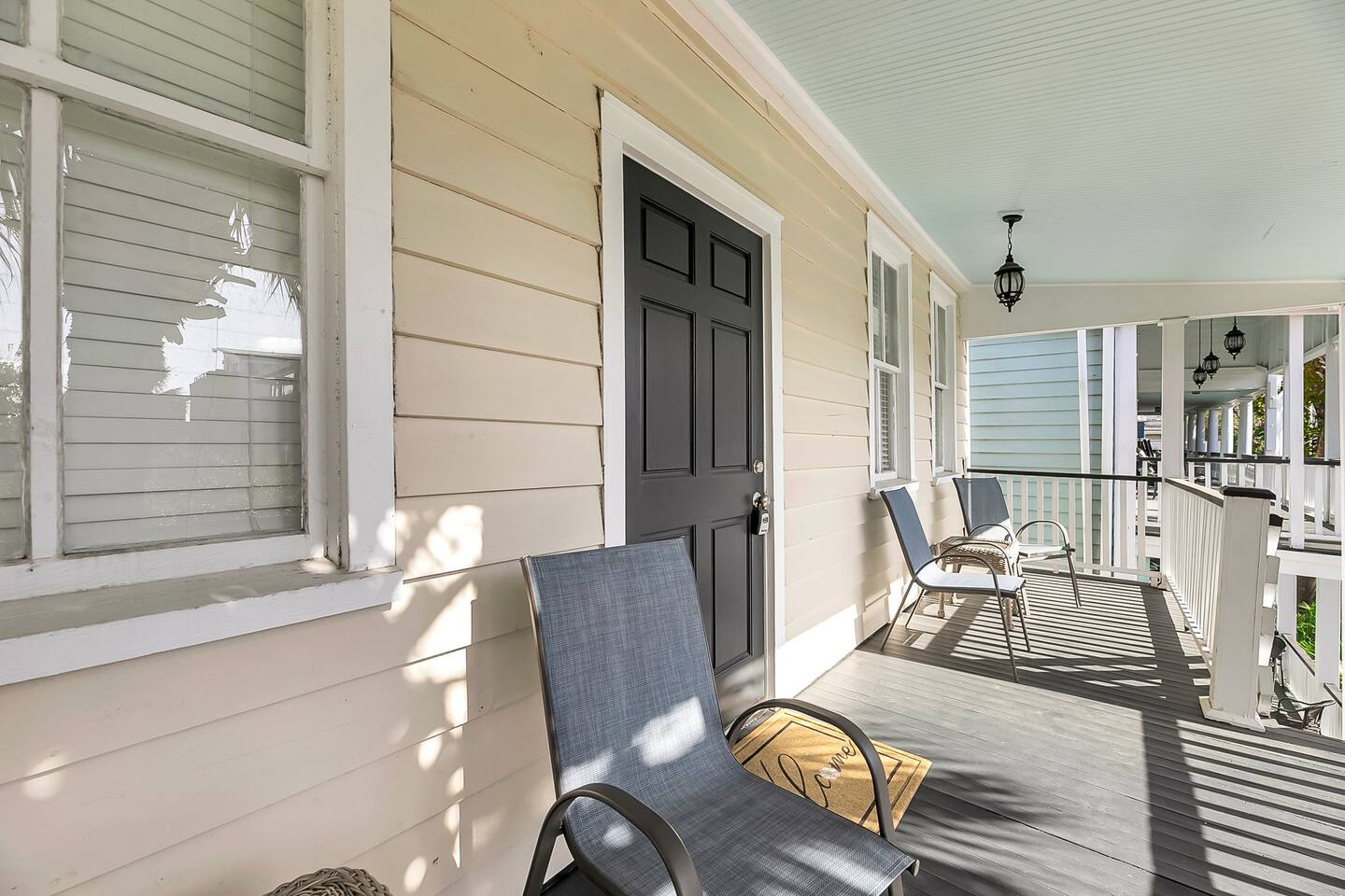 This second floor private porch overlooks our beautiful parking and courtyard area. 