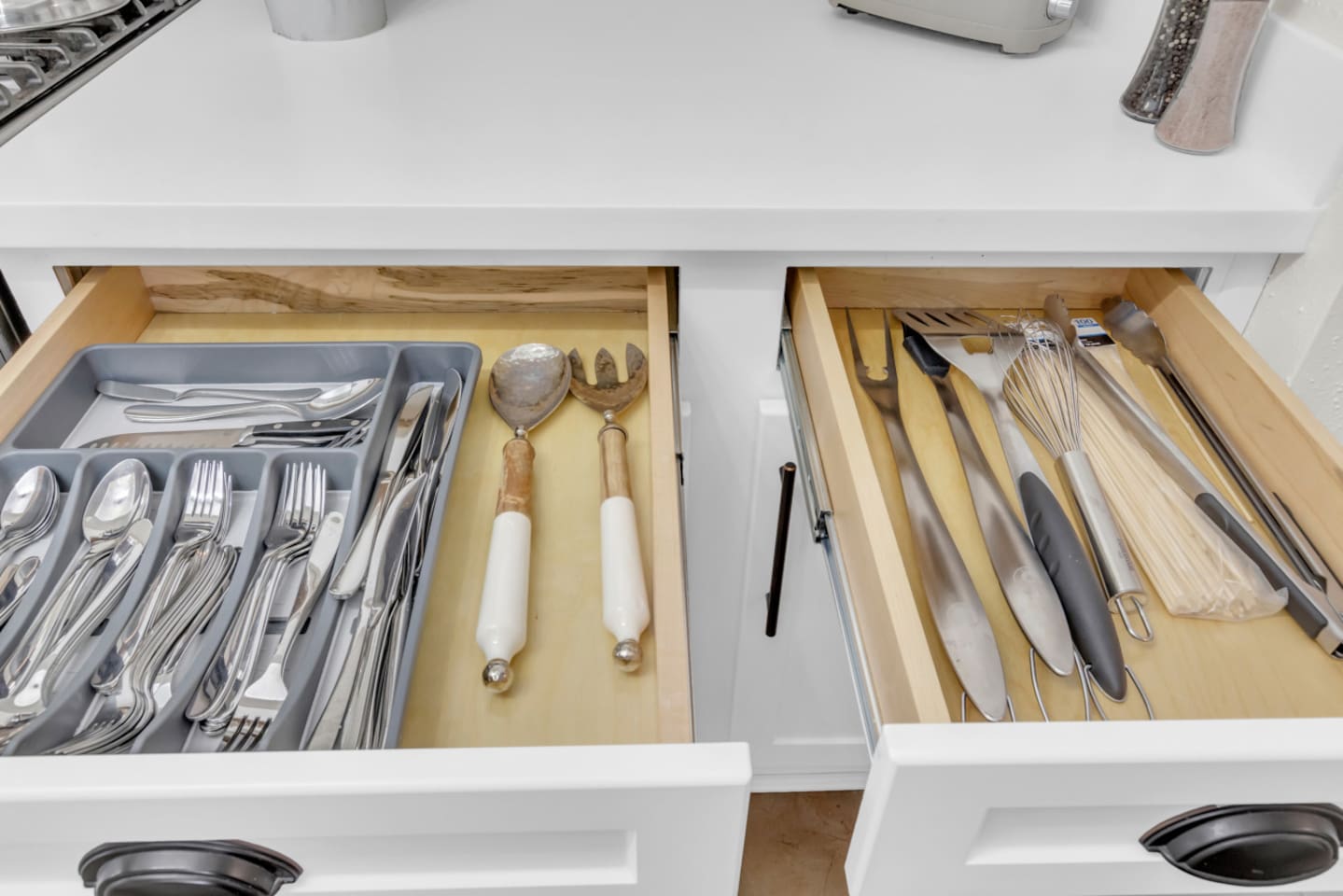 Polished fresh for every reservation! Organized drawers for a  truly guest ready kitchen experience!