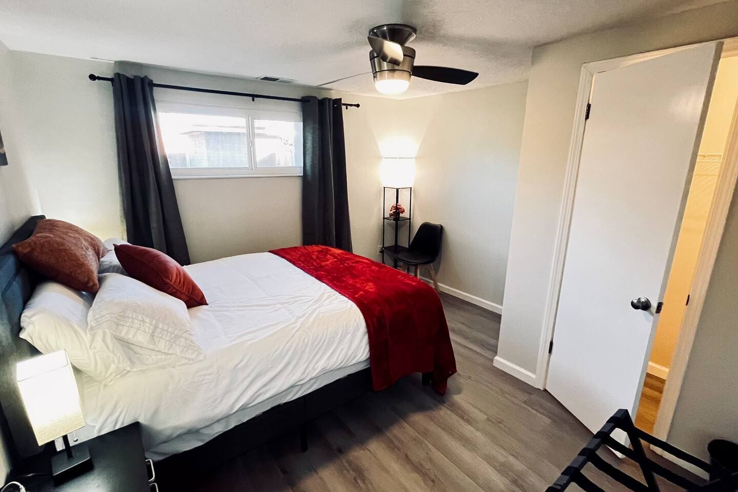Black out curtains, separate closet, chargers on the nightstand. And, have you ever used a white noise machine for sleep? 
