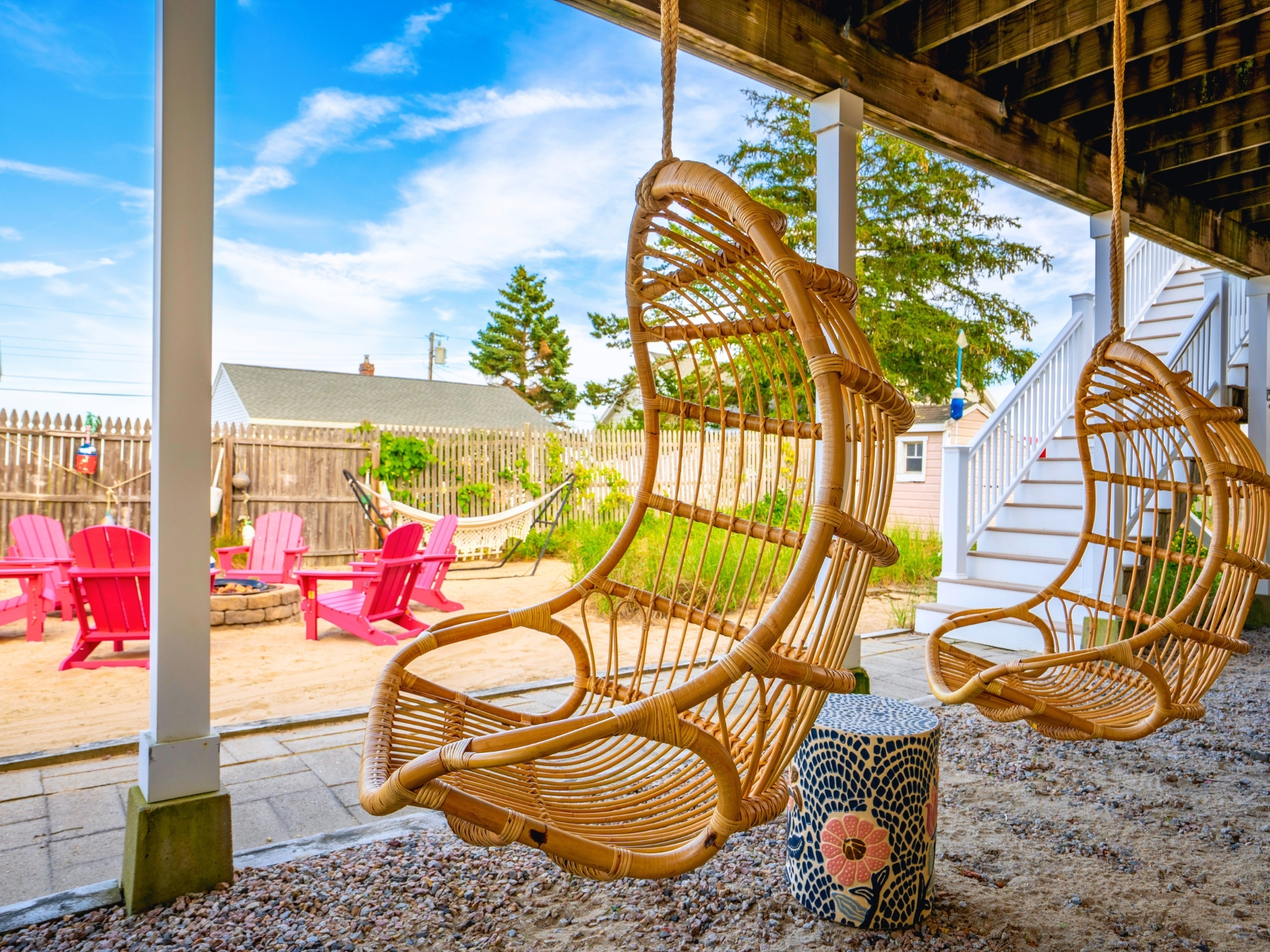 Feel the breeze as you swing back and forth, with the firepit crackling nearby.