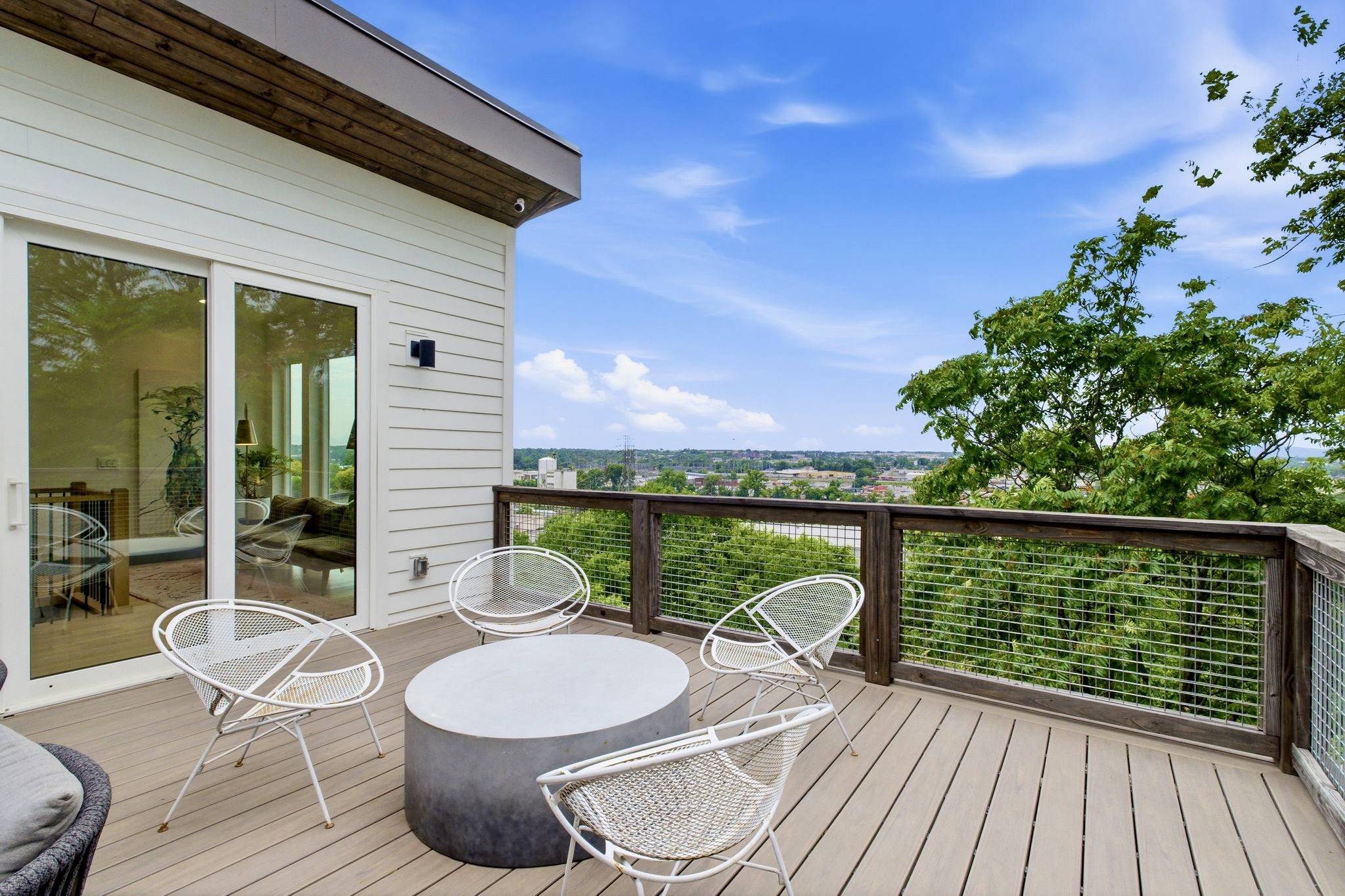 Sunny open deck w/ lounge chairs & wide-open sky — a bright spot to soak up the day.
