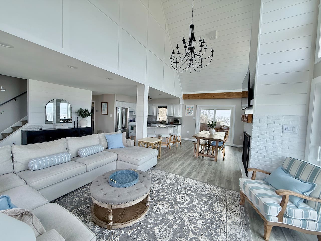 Relax in this airy, coastal-inspired living space. Designed with comfort in mind, it is the perfect retreat for friends and family to gather, unwind, and enjoy a memorable vacation together.