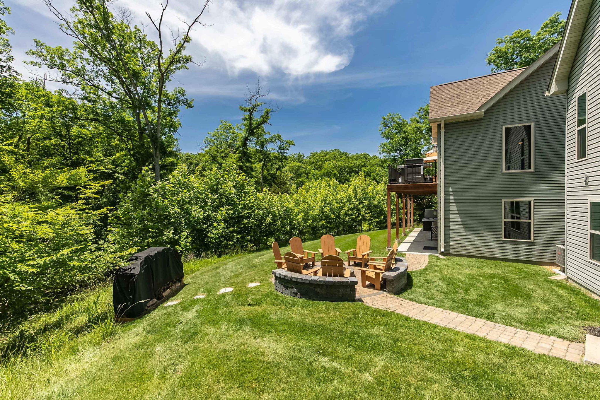 The backyard offers plenty of room to play and explore.