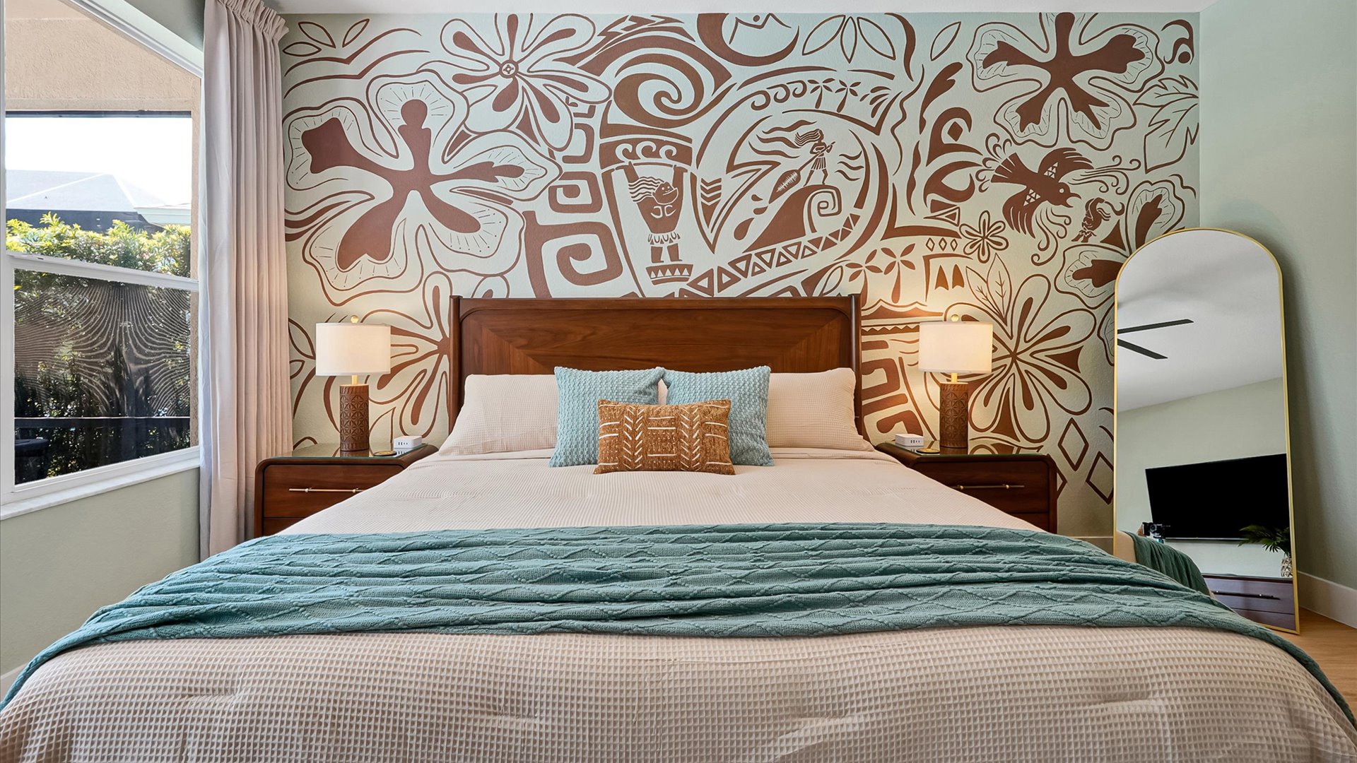 Moana King Suite: Spacious main-floor king retreat with direct access to its private ensuite bathroom.