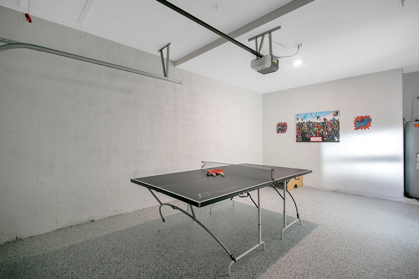 Garage with ping-pong, and kids play table.