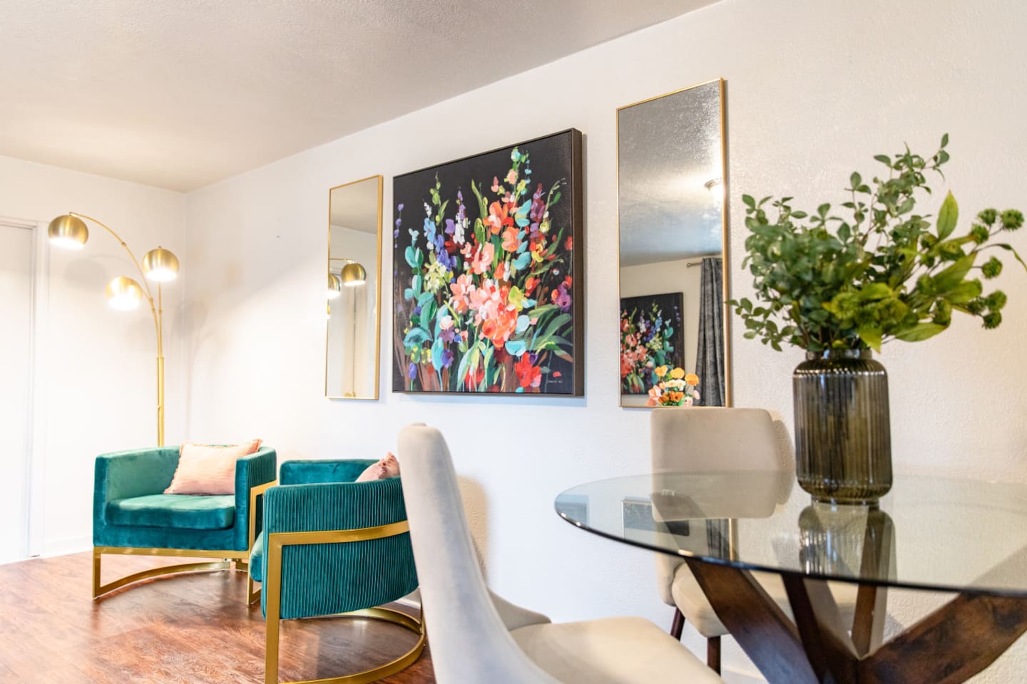 A cozy 4-seater dining area integrated into the living space, creating a multifunctional area for meals, entertaining, or casual gatherings.