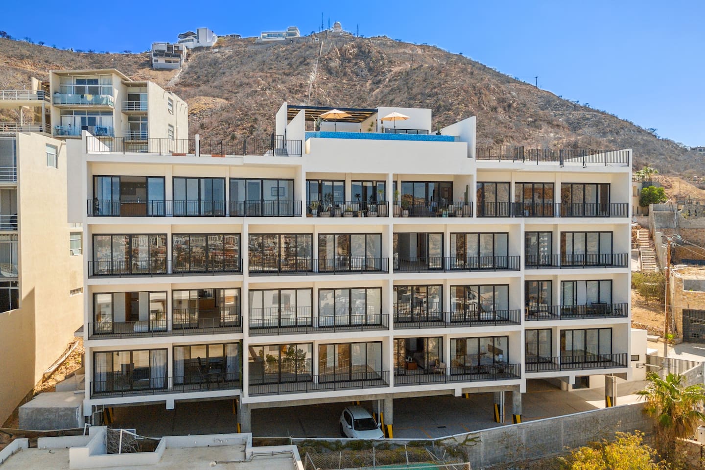Experience luxury in this 5-story Cabo building, surrounded by breathtaking mountain and ocean views. Ideal for an upscale stay with stunning vistas and modern amenities in your Mexico getaway.