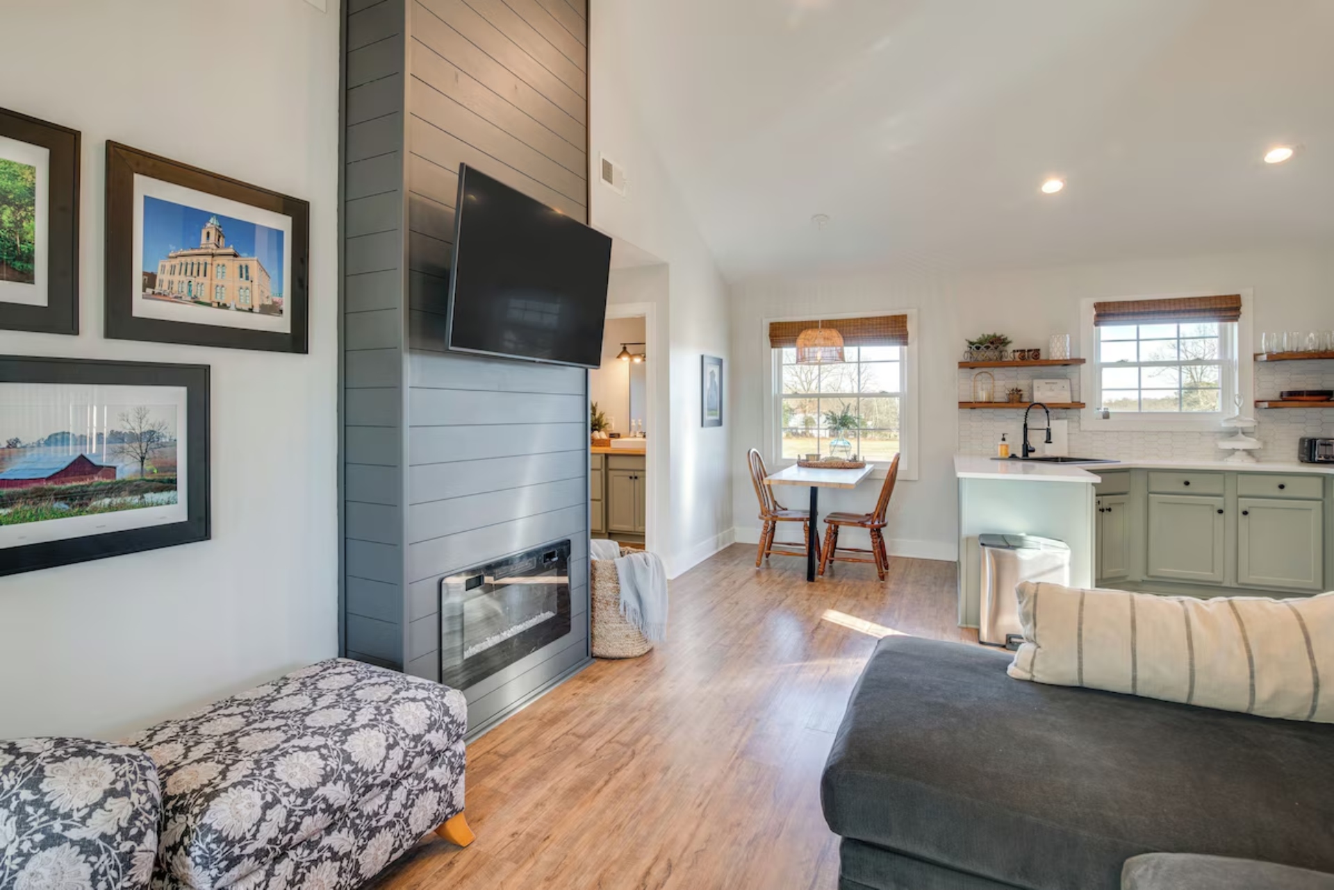 Living area with ceiling fans and smart TV