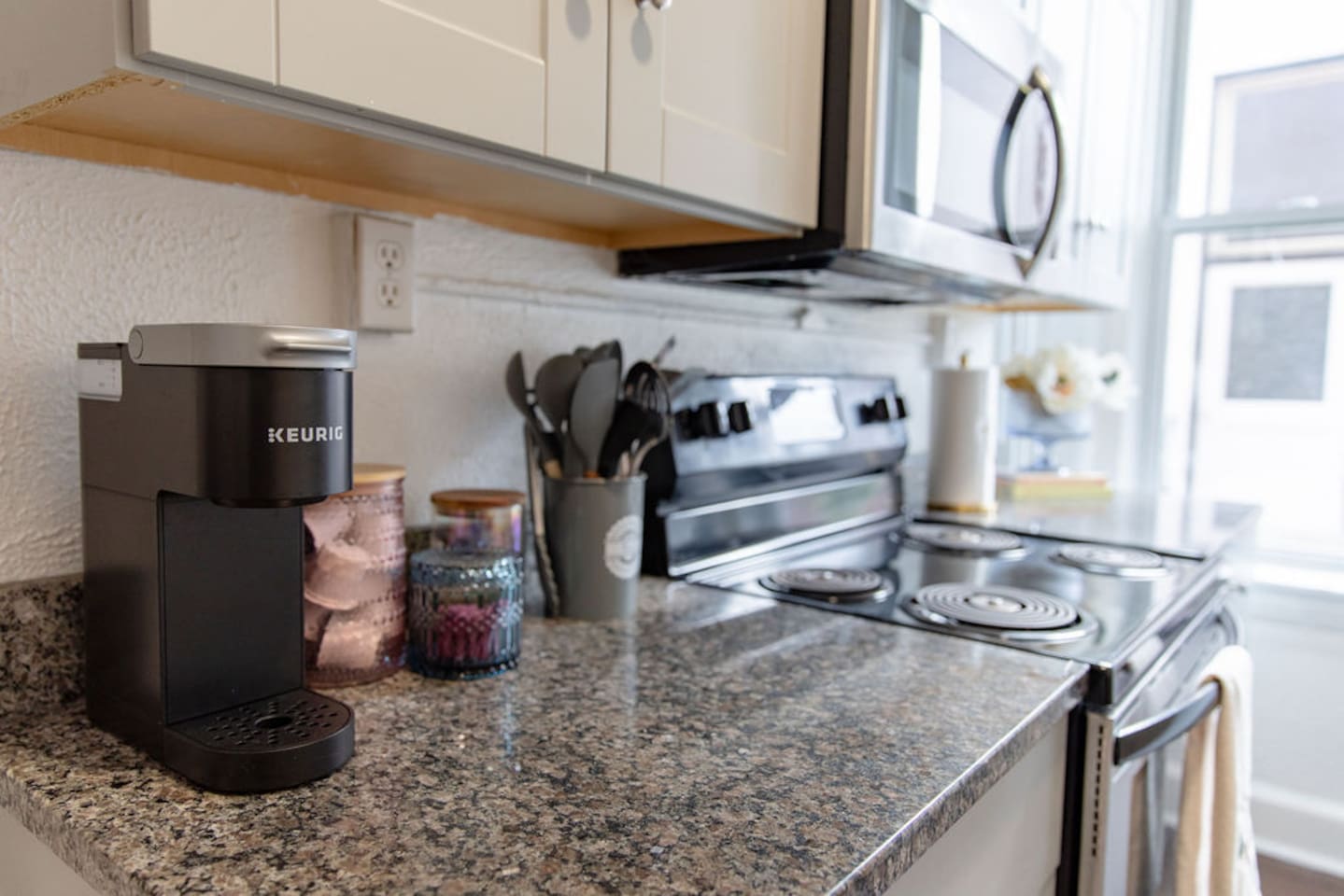 Full kitchen featuring sleek, modern stainless steel appliances for a stylish and functional cooking space.
