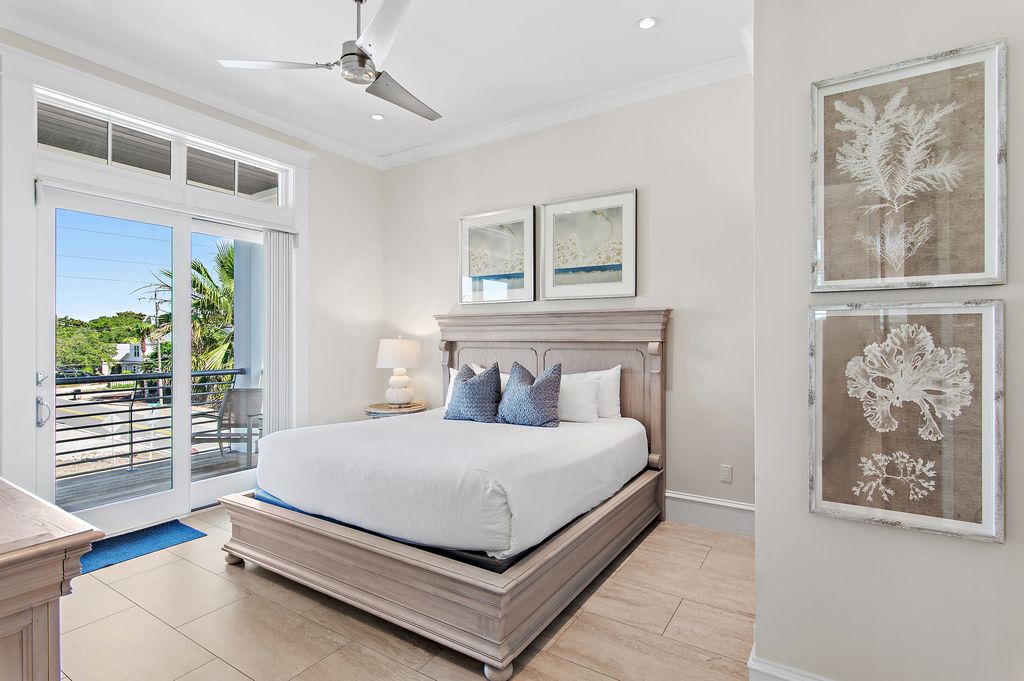 Bedroom 4 (Second Floor): King bed and twin-over-twin bunk bed with private bathroom 