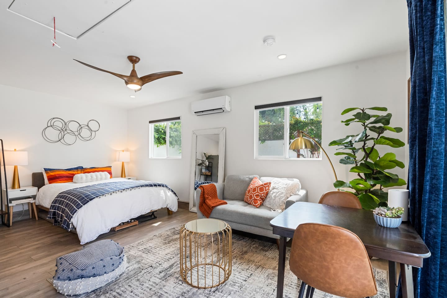 A full view of our inviting bed and living area, designed for relaxation and convenience.