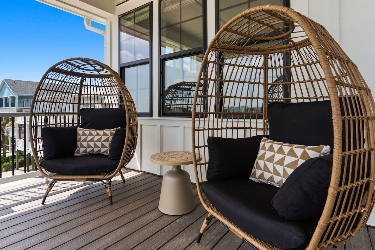 Relax in comfort & style on one of the front porches, featuring cozy egg chairs with peaceful sound views. These inviting spaces are the perfect spot to sip your morning coffee, enjoy a sunset, or simply slow down & take in the beauty of Oak Island.