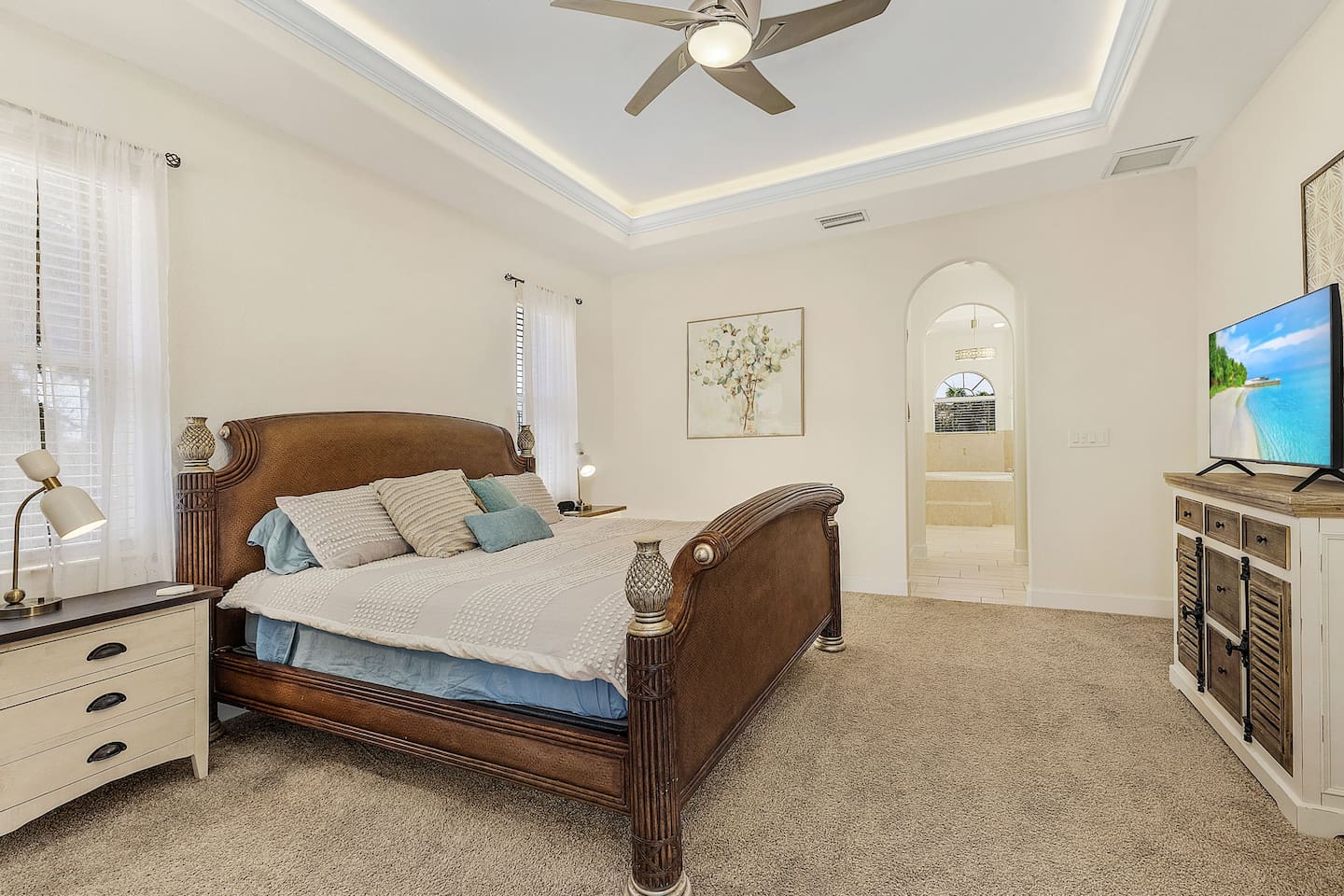 Indulge in a plush king-size bed and elegant decor in the primary suite!