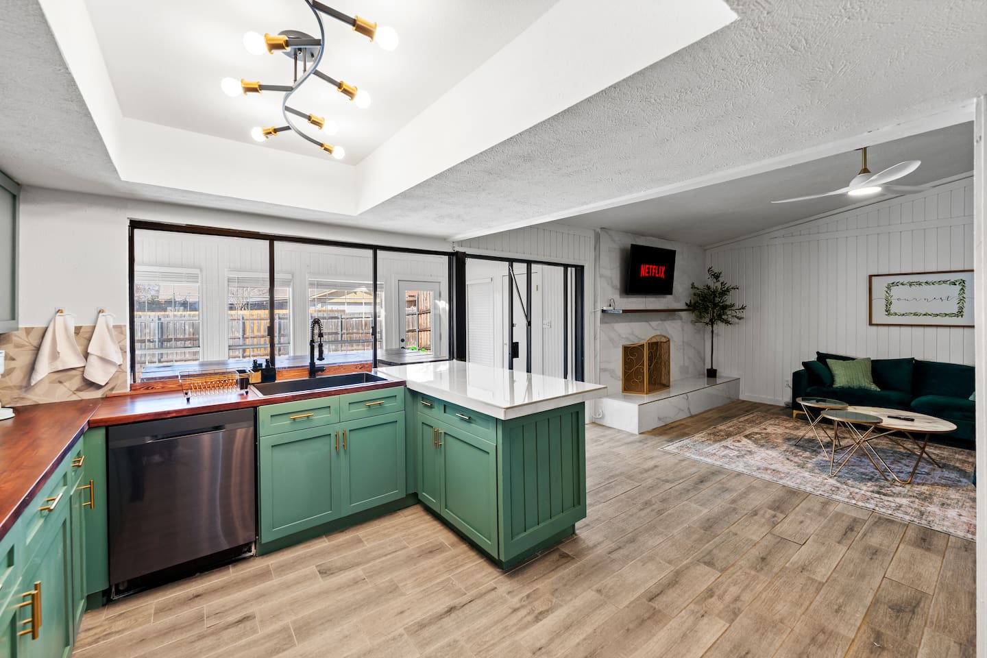 Bright, open kitchen with modern appliances and clean lines—perfect for cooking, entertaining, and staying connected to the group.