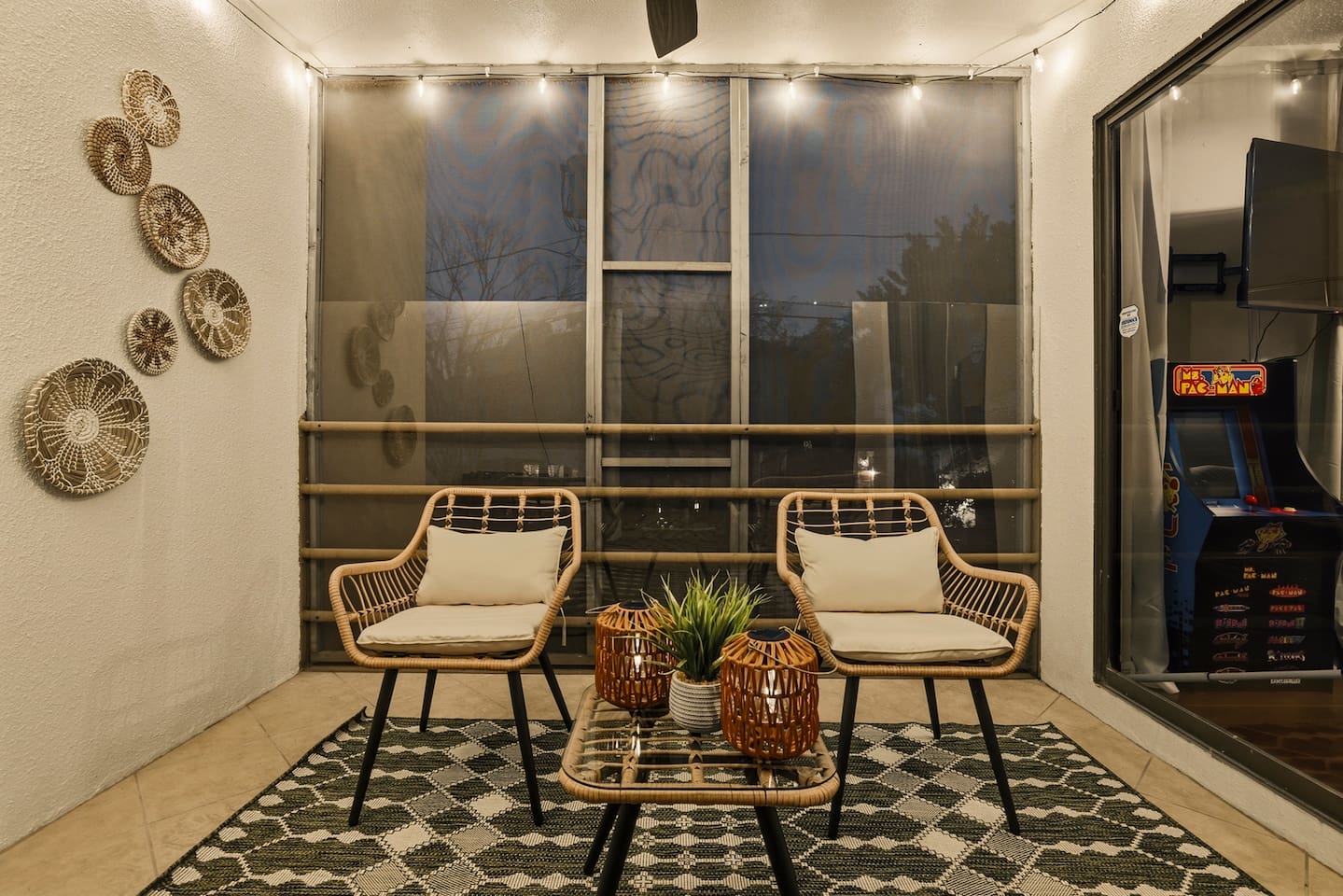 Spacious private balcony with direct access from the kitchen and Bedroom 4, complete with cozy string lights and a mini foosball table — perfect for evening gatherings or casual games.