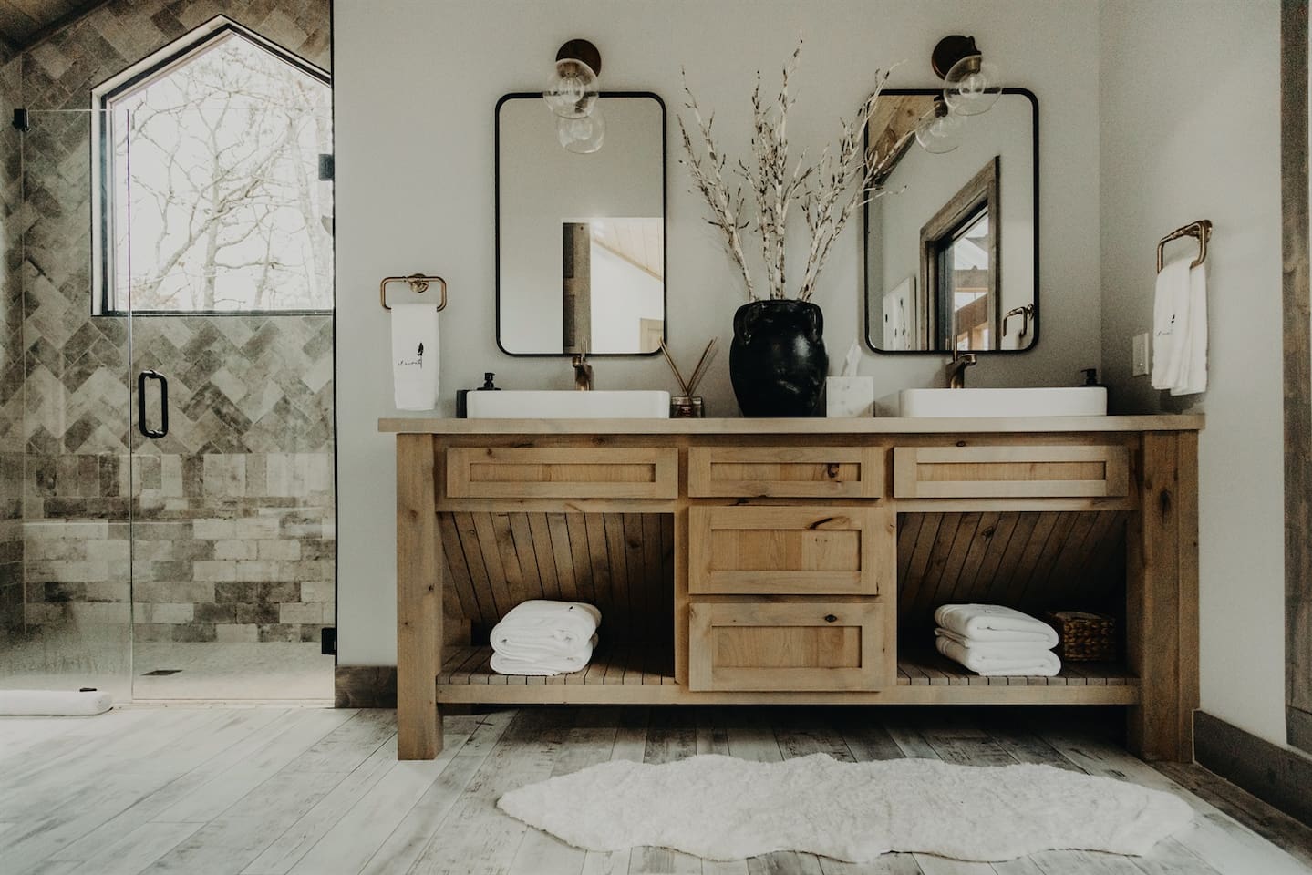 In-suite luxury bathroom. Spacious and stocked with everything you need at our cabin.