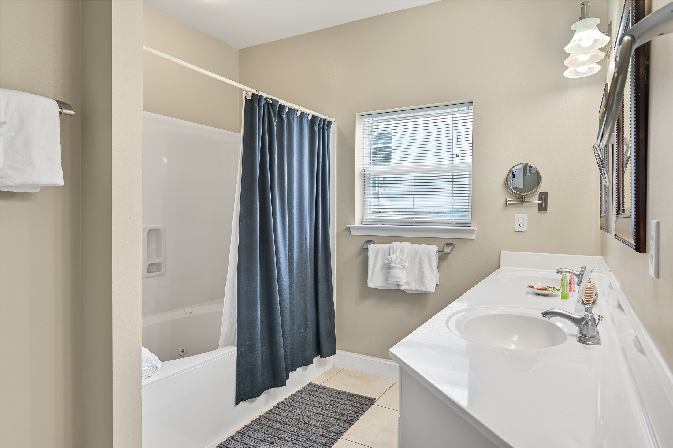 BEDROOM #4 + BATHROOM #4: King Bed with night stands, dresser, and TV. This bedroom has a private ba