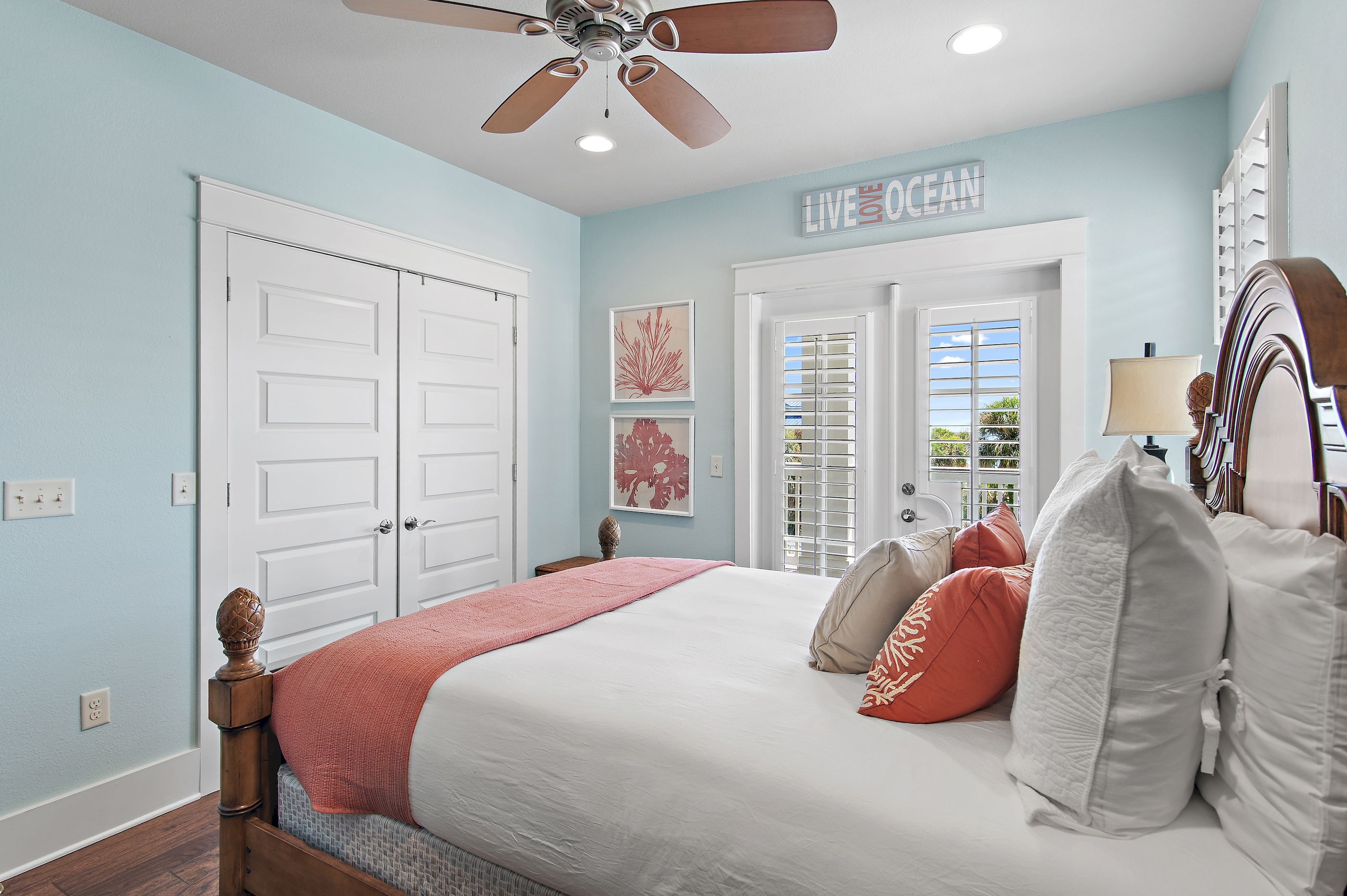 Relax in this beautifully appointed coastal bedroom, featuring a comfortable king bed and soothing beach inspired décor.
