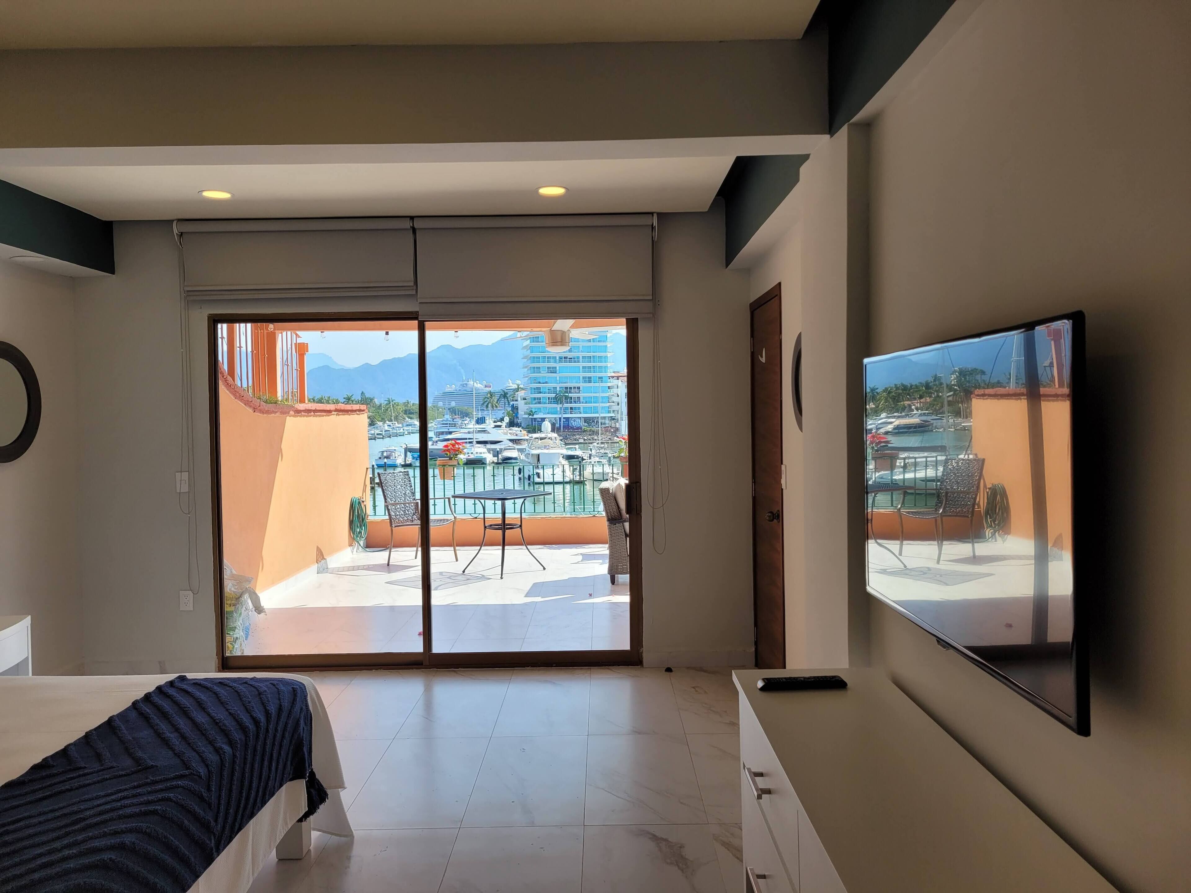 Master bedroom looking at the boats from your bed