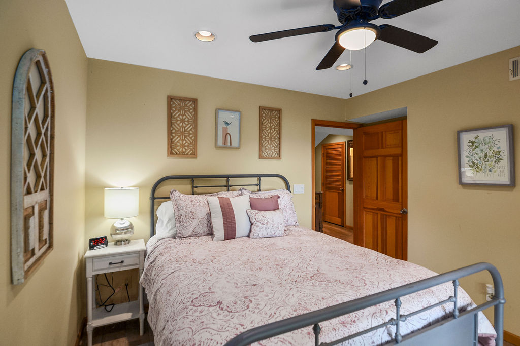 Queen Bedroom with Walkout to Amazing Lake Views