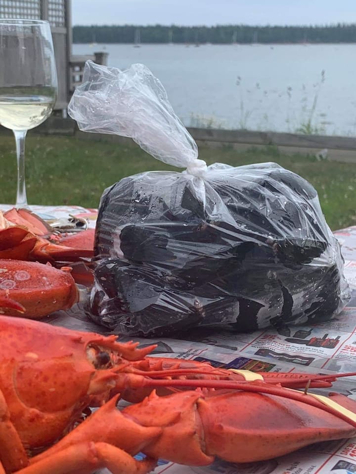 Enjoy your seafood feast outside by the water!