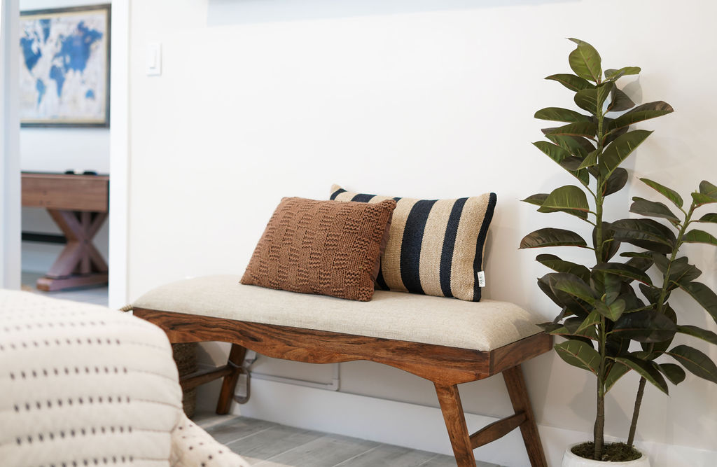 Yacht decor and bench in the Boathouse room.