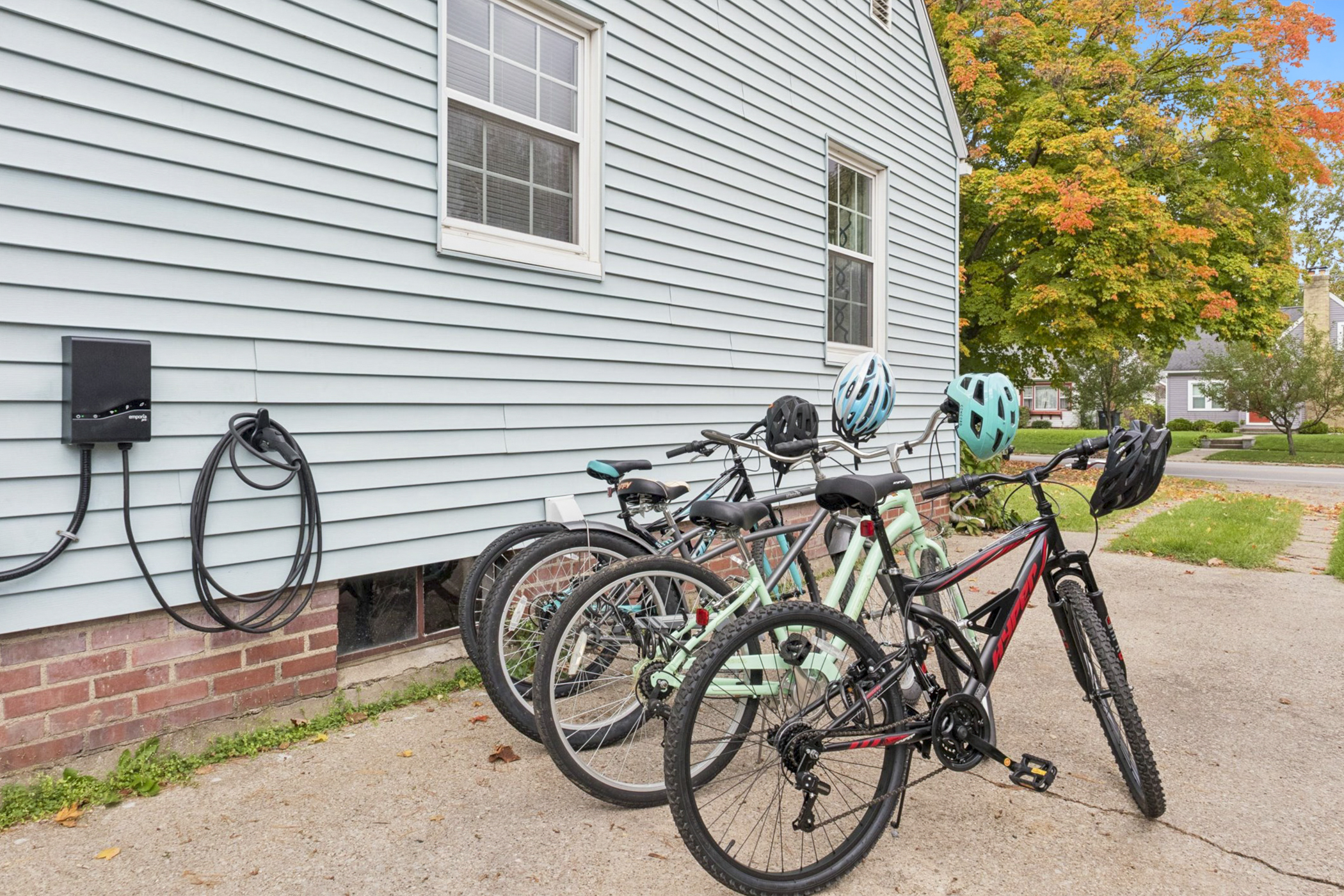 Eco-friendly and adventure-ready—four bikes, helmets, and locks line the driveway beside our NEMA 14-50 outlet. Park, charge, and explore Notre Dame or downtown South Bend with ease.