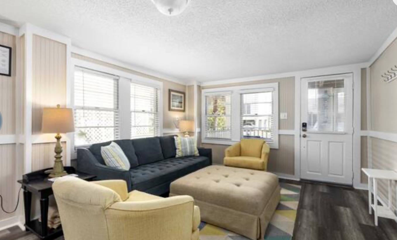 Gather in the bright, open living area where there is room for everyone to stretch out after a day on the sand. ⭐