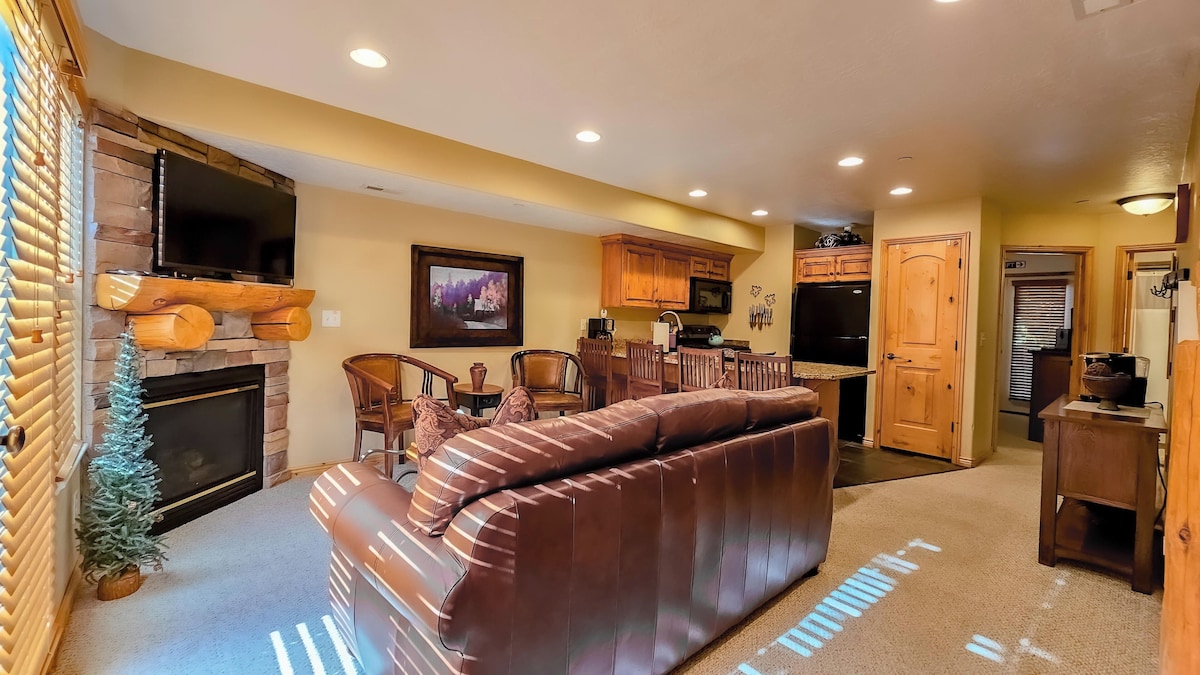 The open-concept living space, complete with a dining area, facilitates effortless conversation with family and friends.