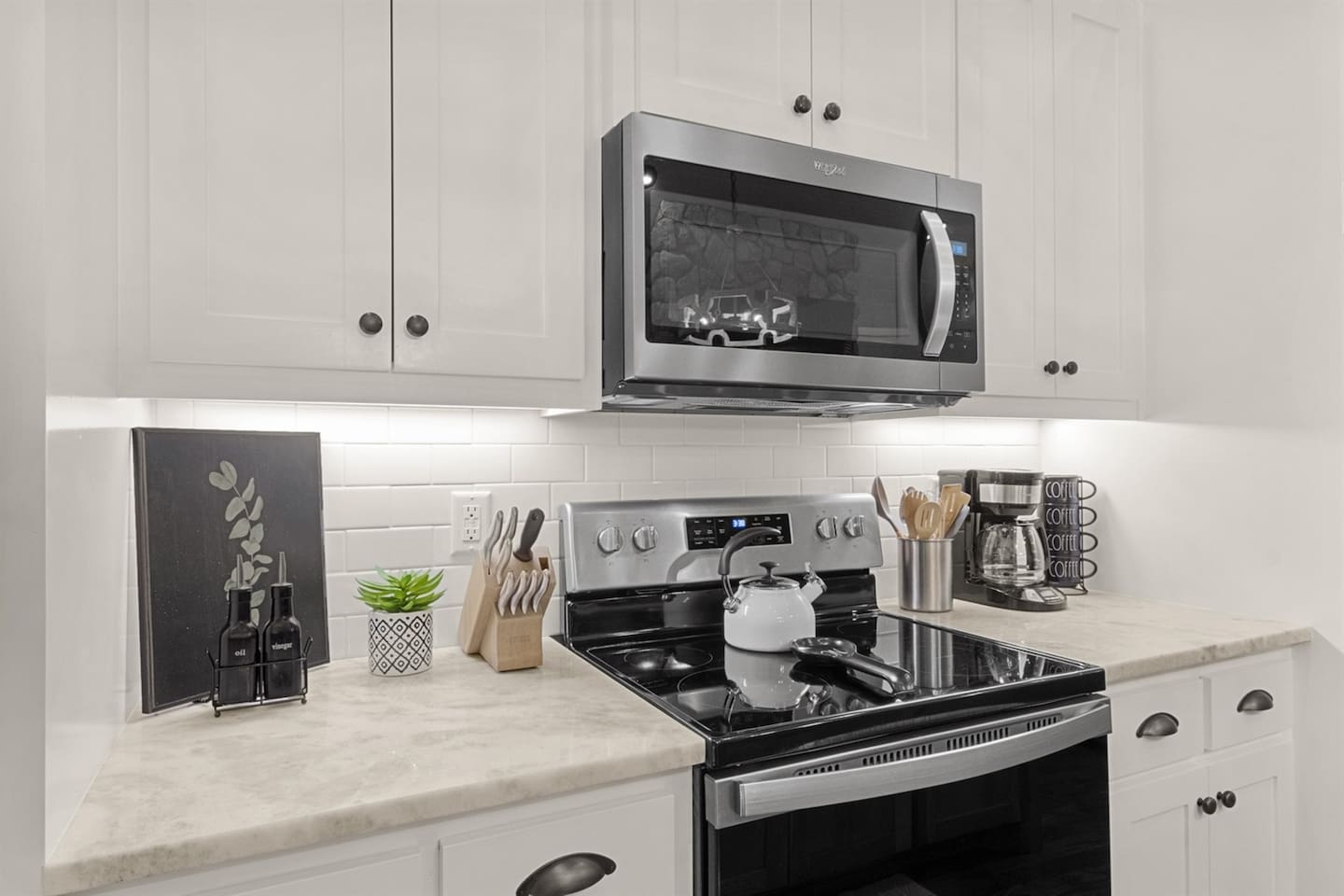 Sleek granite countertops meet stainless steel appliances—your stylish and fully equipped kitchen ready for all your culinary adventures.
