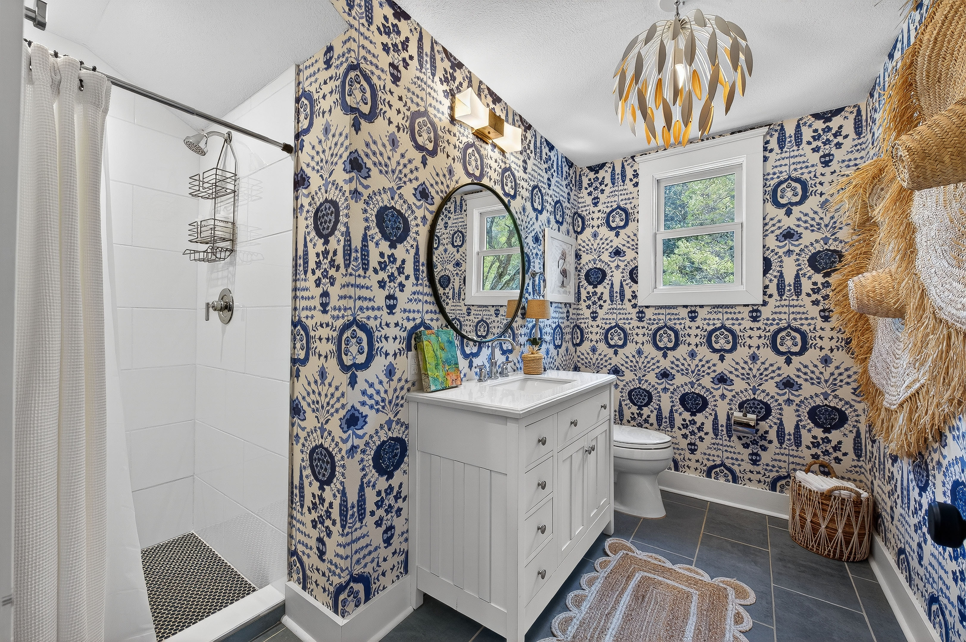 2nd floor full bathroom- statement blue wallpaper bath with custom vanity and walk-in shower—bold, beautiful, and thoughtfully designed. 