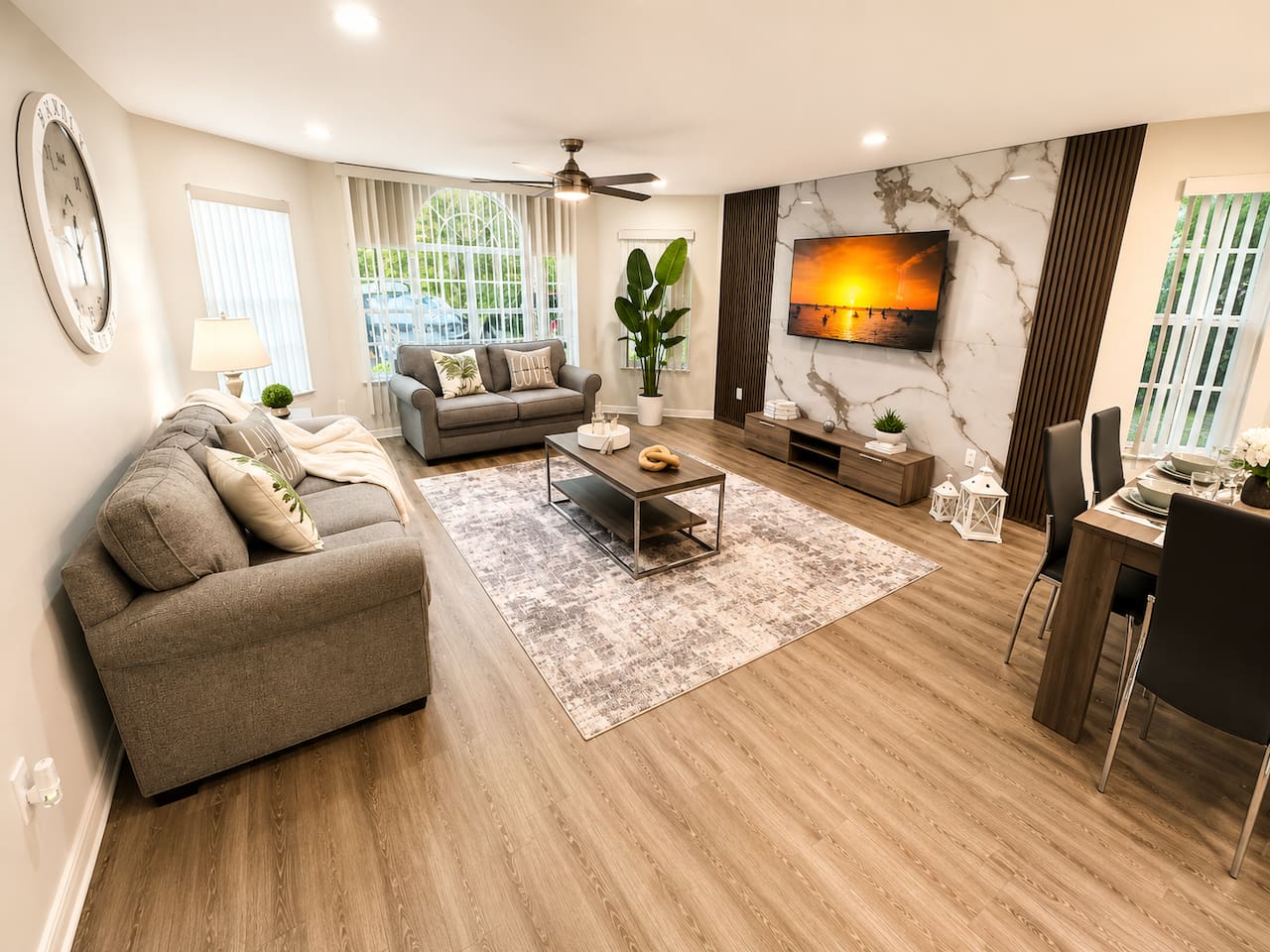 Living room with comfortable seating and an open layout for relaxing together.