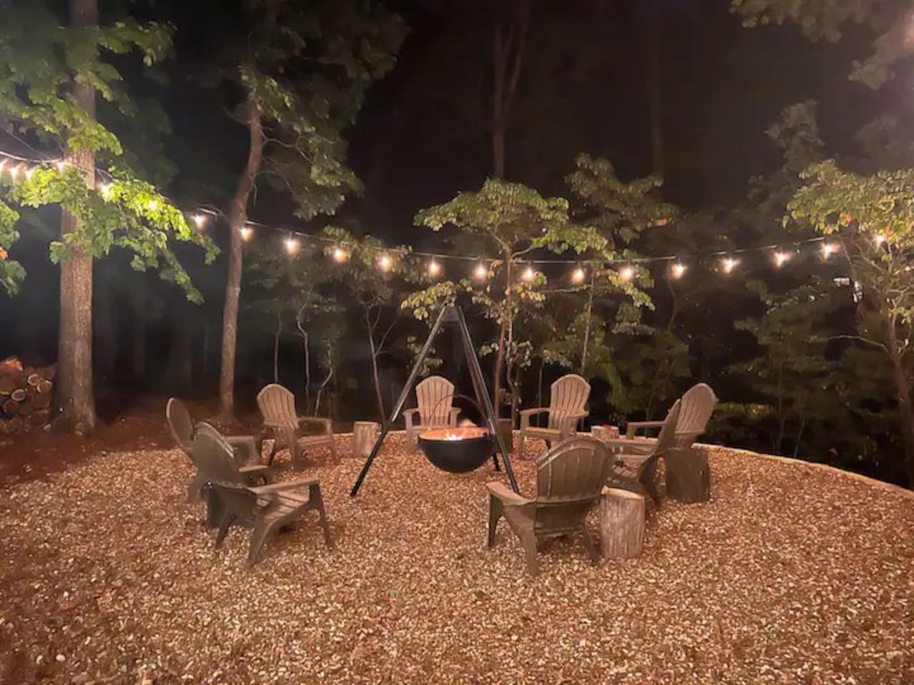 Firepit under the stars with cozy string lights