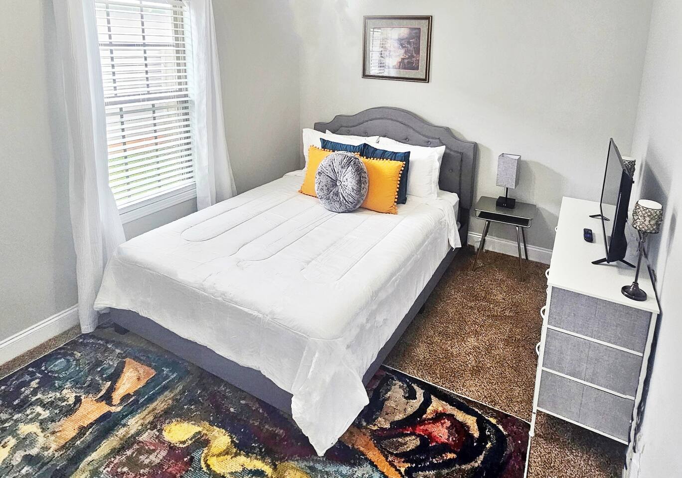Enjoy this simple and calming guest queen bedroom. Perfect for 2. 
Full-length mirror & closet space.