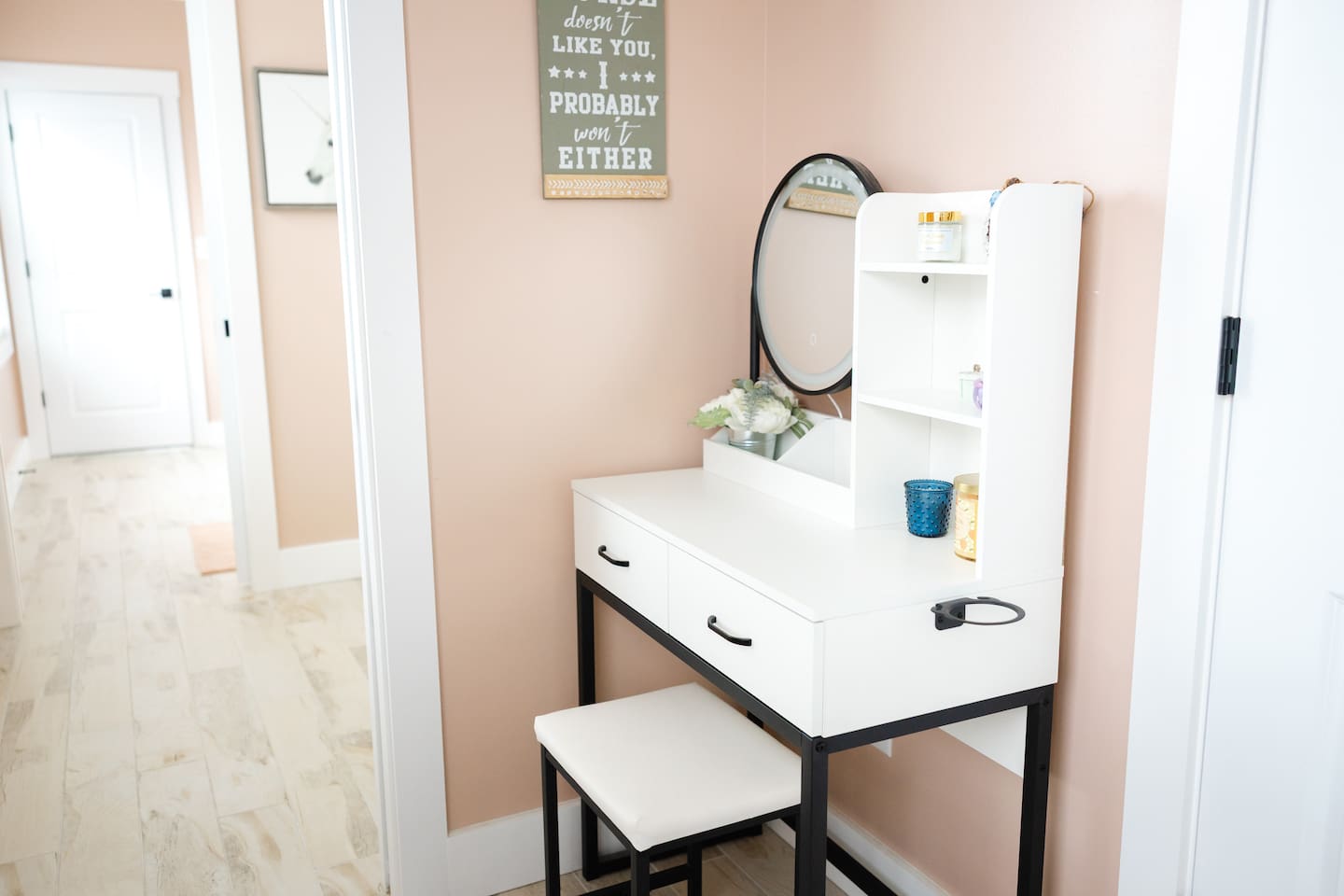 View looking from doorway of bedroom #5 through private sink/vanity area to bedroom #4's private sink/vanity area. Sliding doors for privacy in between with separate toilet and shower rooms. 