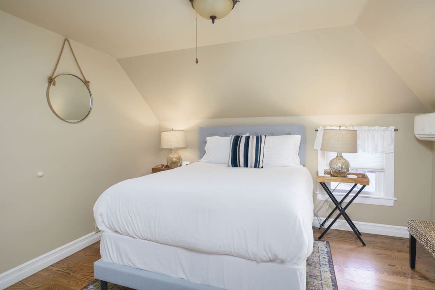 Phone chargers on both sides of the bed, and luggage racks in the closet for easy unpacking. Enjoy personalized comfort with 24/7 AC and heating.