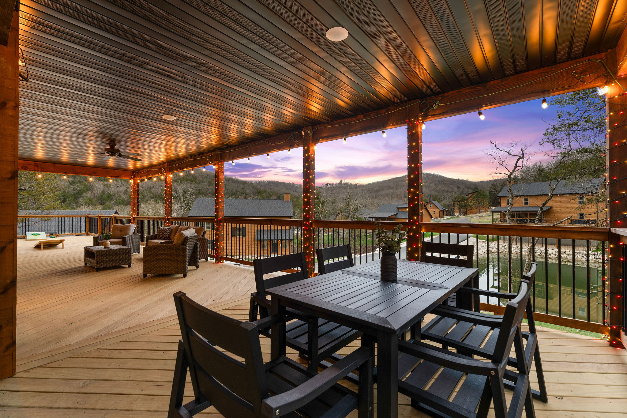 Large covered deck with room to dine, lounge, and relax.