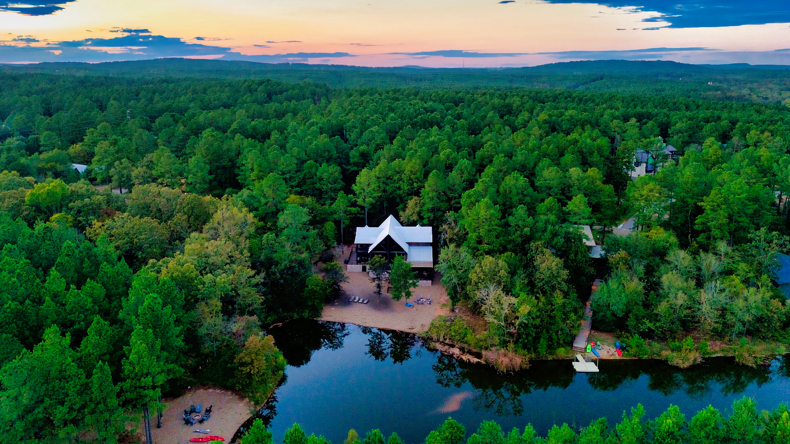 Welcome to Skippin’ Rocks—a 6,300-sq-ft luxury cabin where every stay begins with private pond views and ends with unforgettable memories.