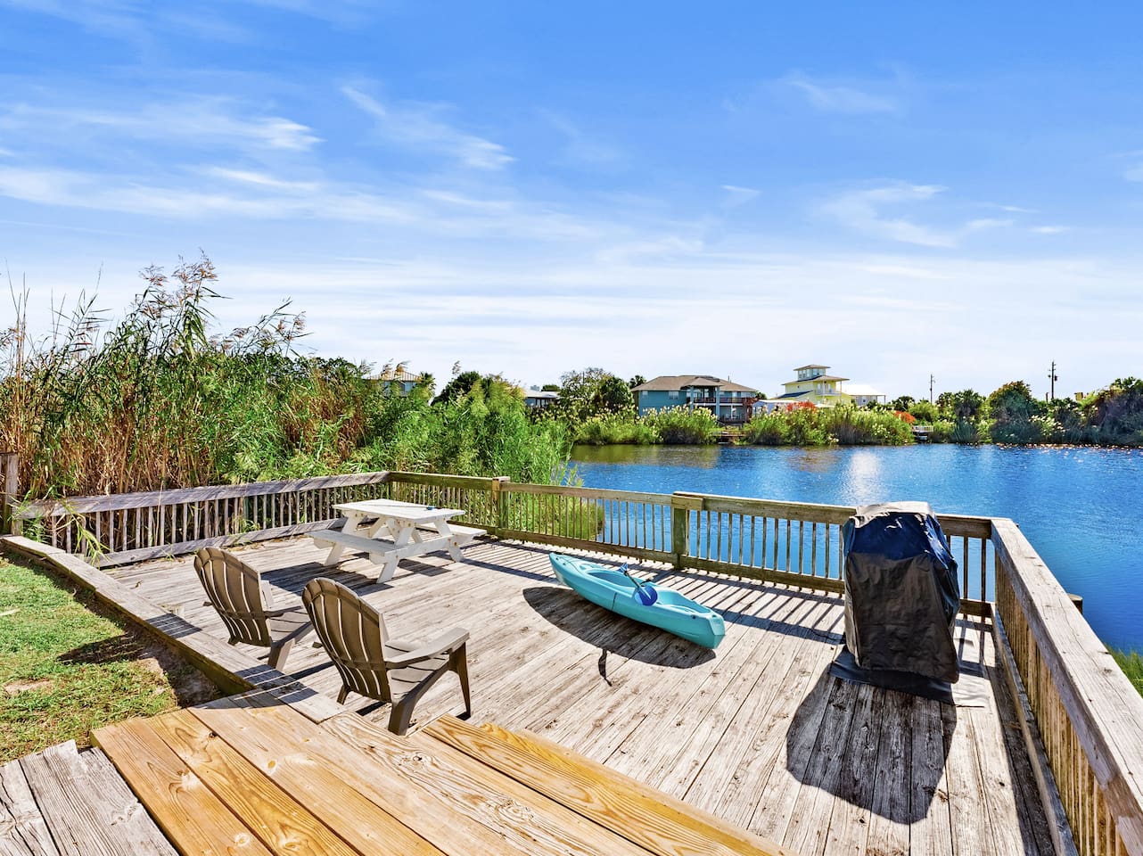 Grill and chill on the lower deck overlooking the water.