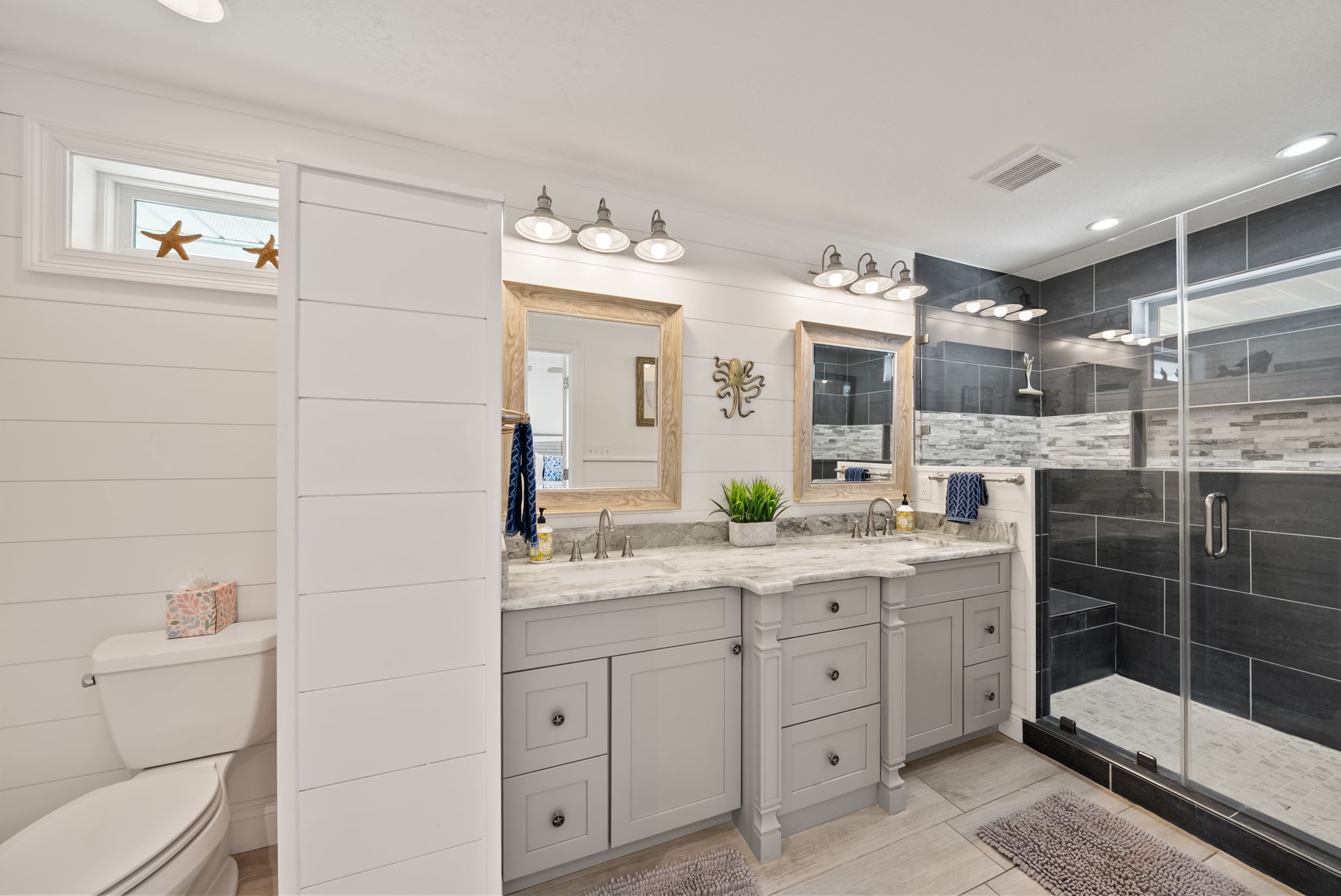 Master ensuite bathroom that has been newly updated with double vanity and huge walk in shower. 