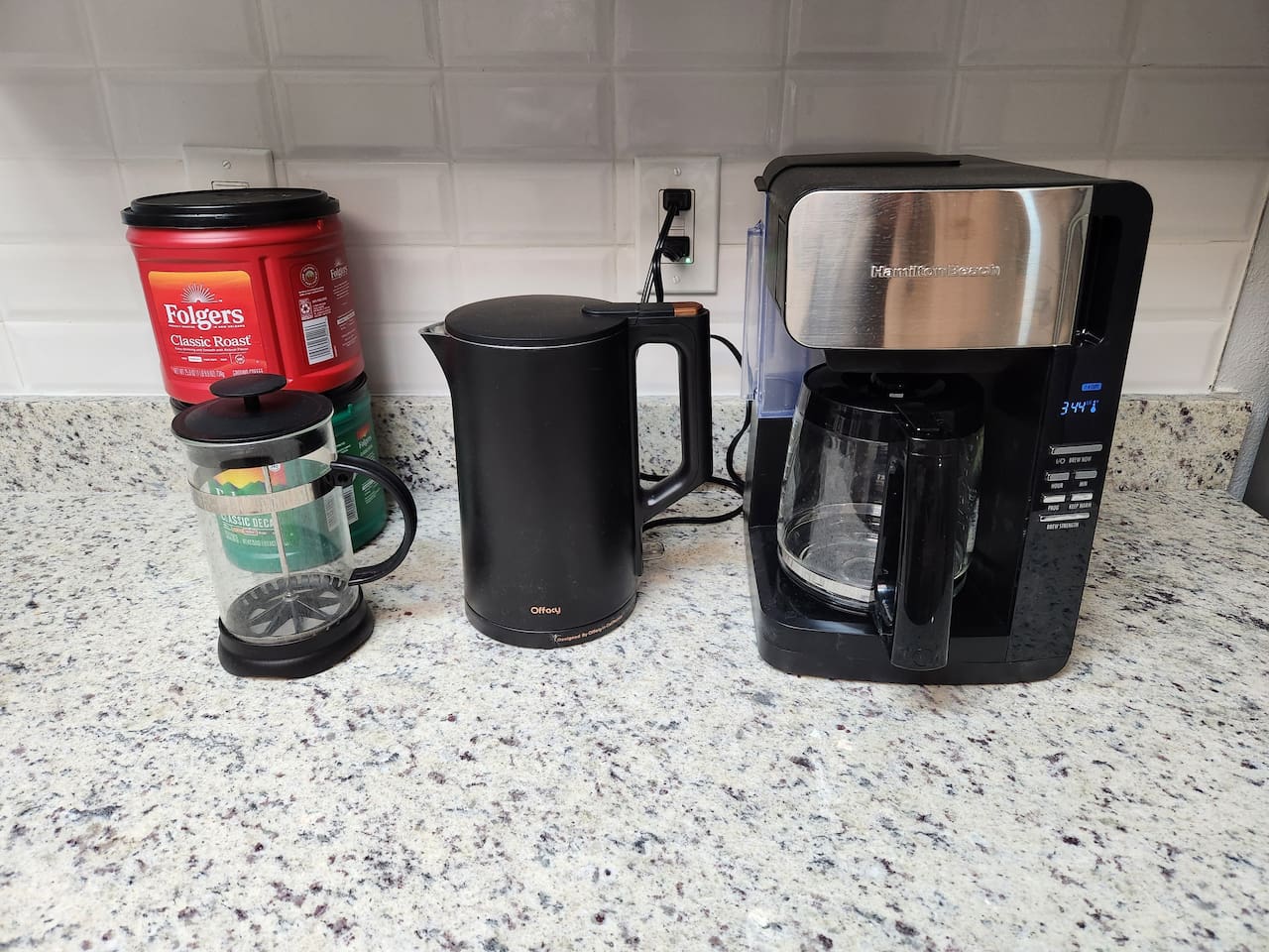 Coffee station: coffee, coffee maker, French press coffee, water kettle