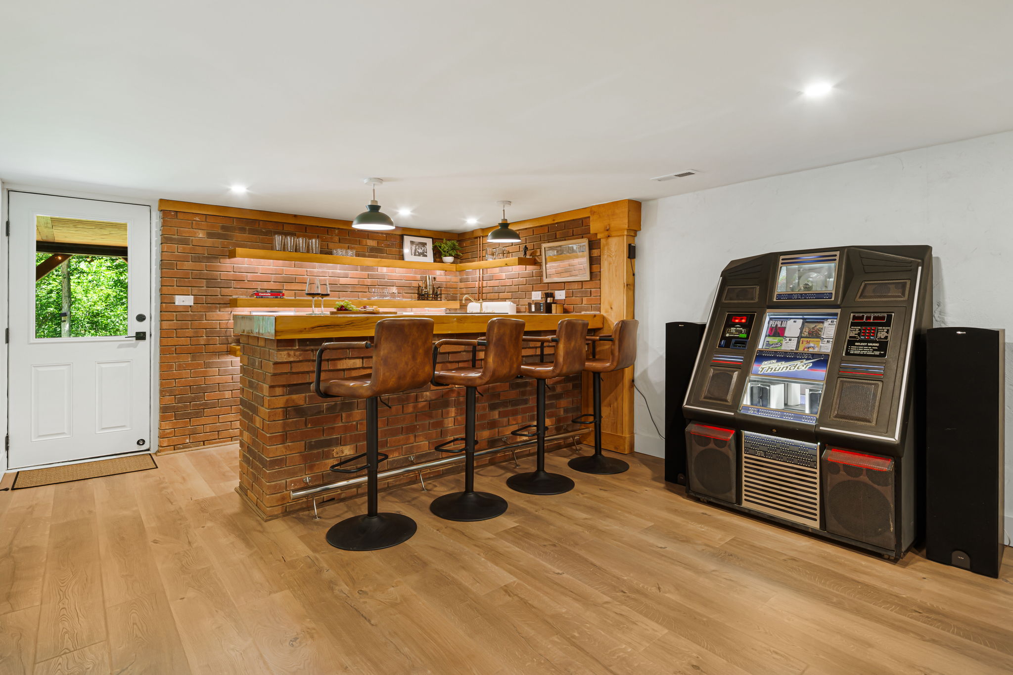 This 1996 Digital Thunder jukebox was restored to be used in this space free of charge! With 100 CDs with a wide selection of music genres, this jukebox will please everyone. 